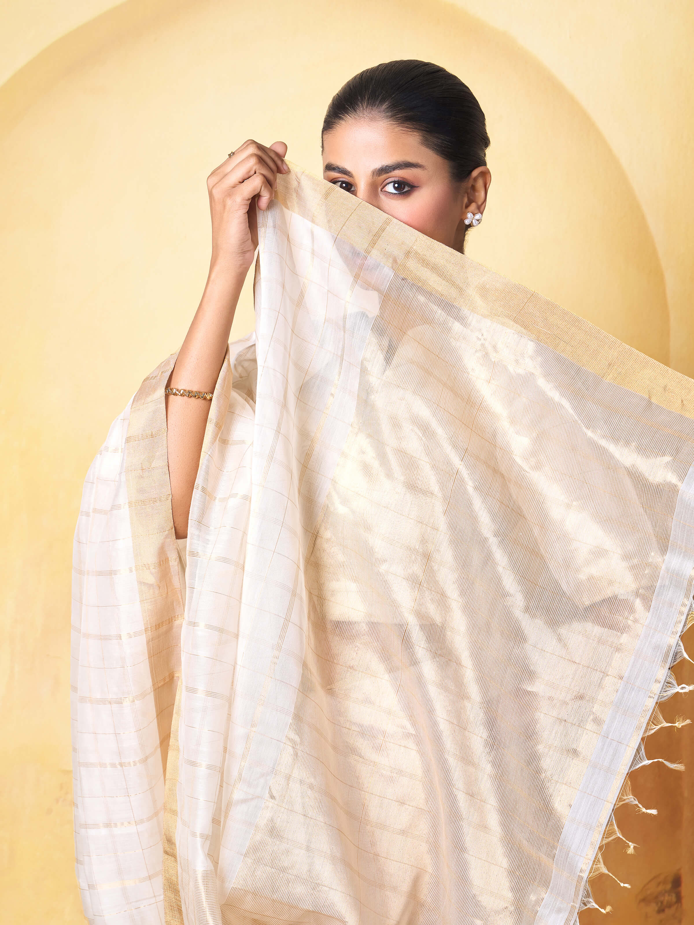 Detail shot of Off-white Cotton Silk Chanderi Saree focusing on cotton silk texture and subtle shimmer
