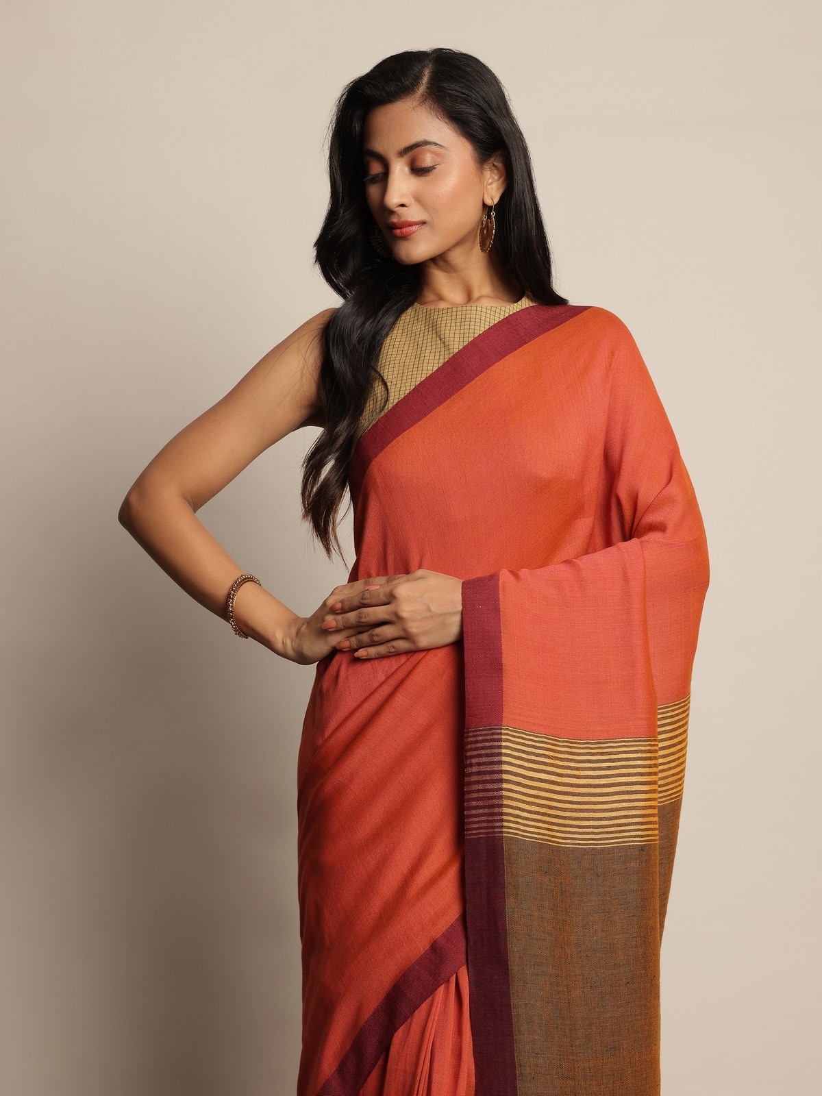 Alternate lifestyle view showing soft drape and pallu of grey linen saree.