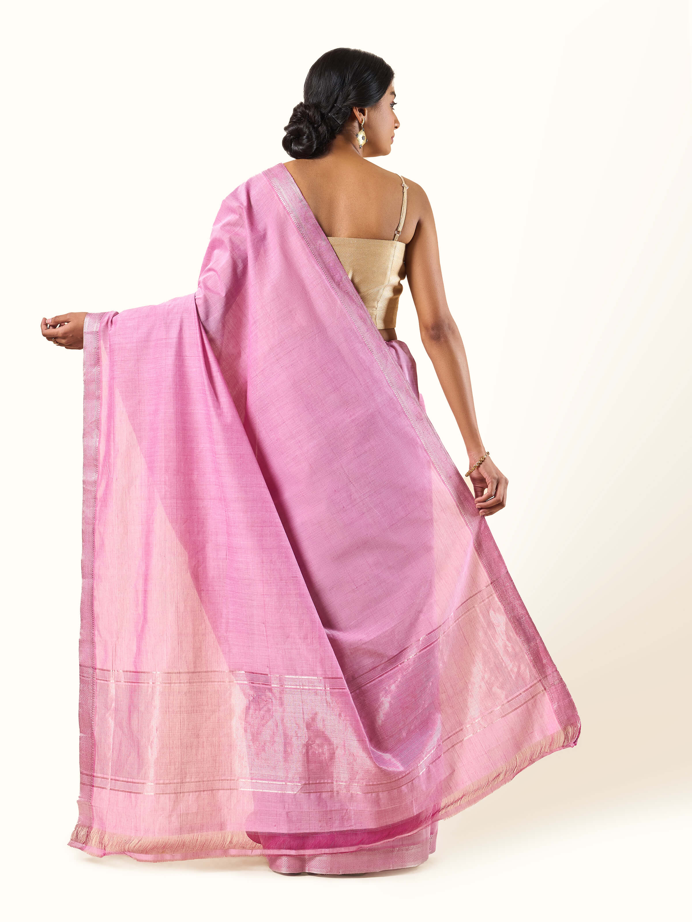 Back view of pink Mangalgiri saree showing pleats and transparent drape