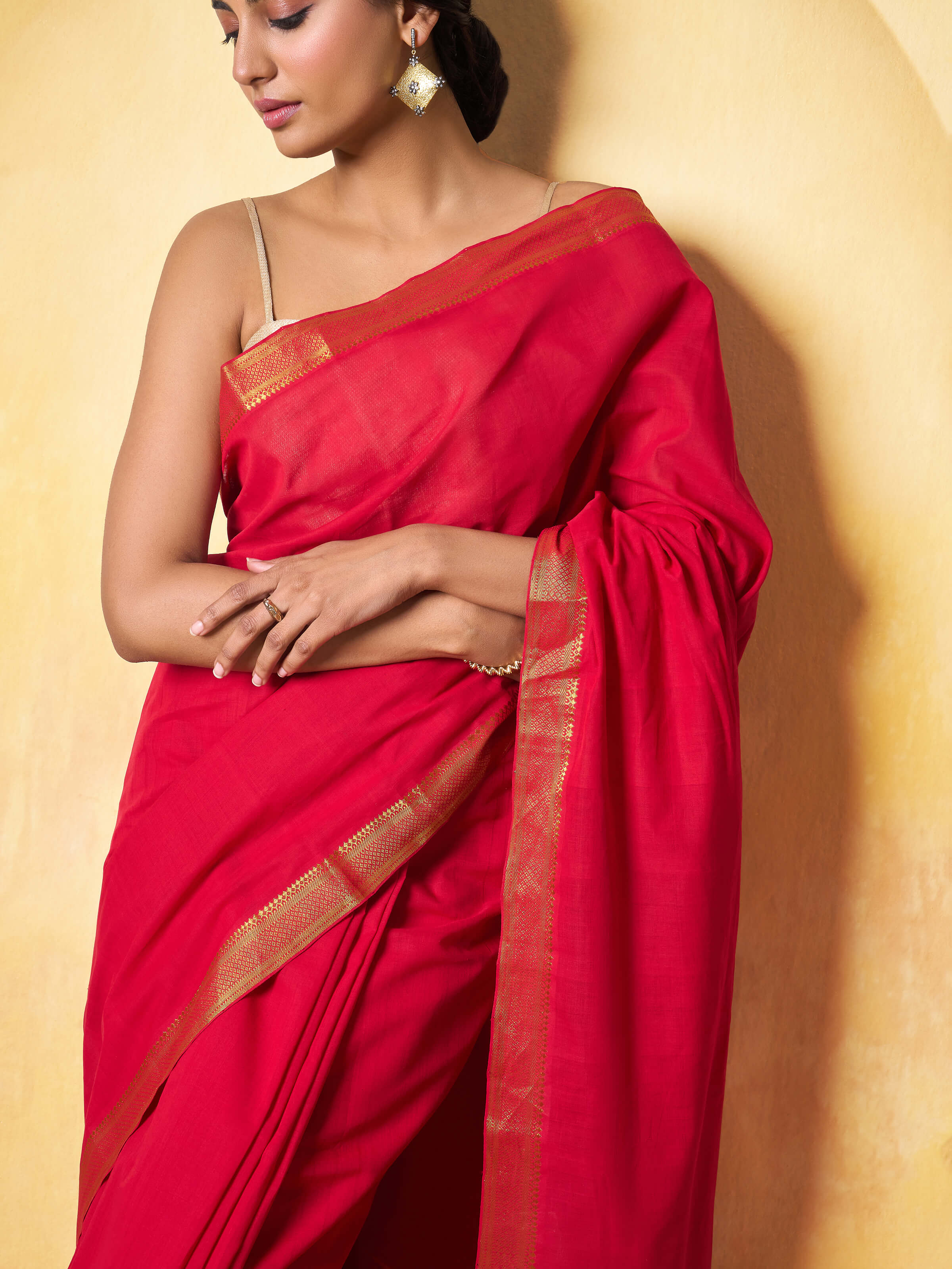 Detail shot capturing the fine weave and shimmer of Mangalgiri fabric