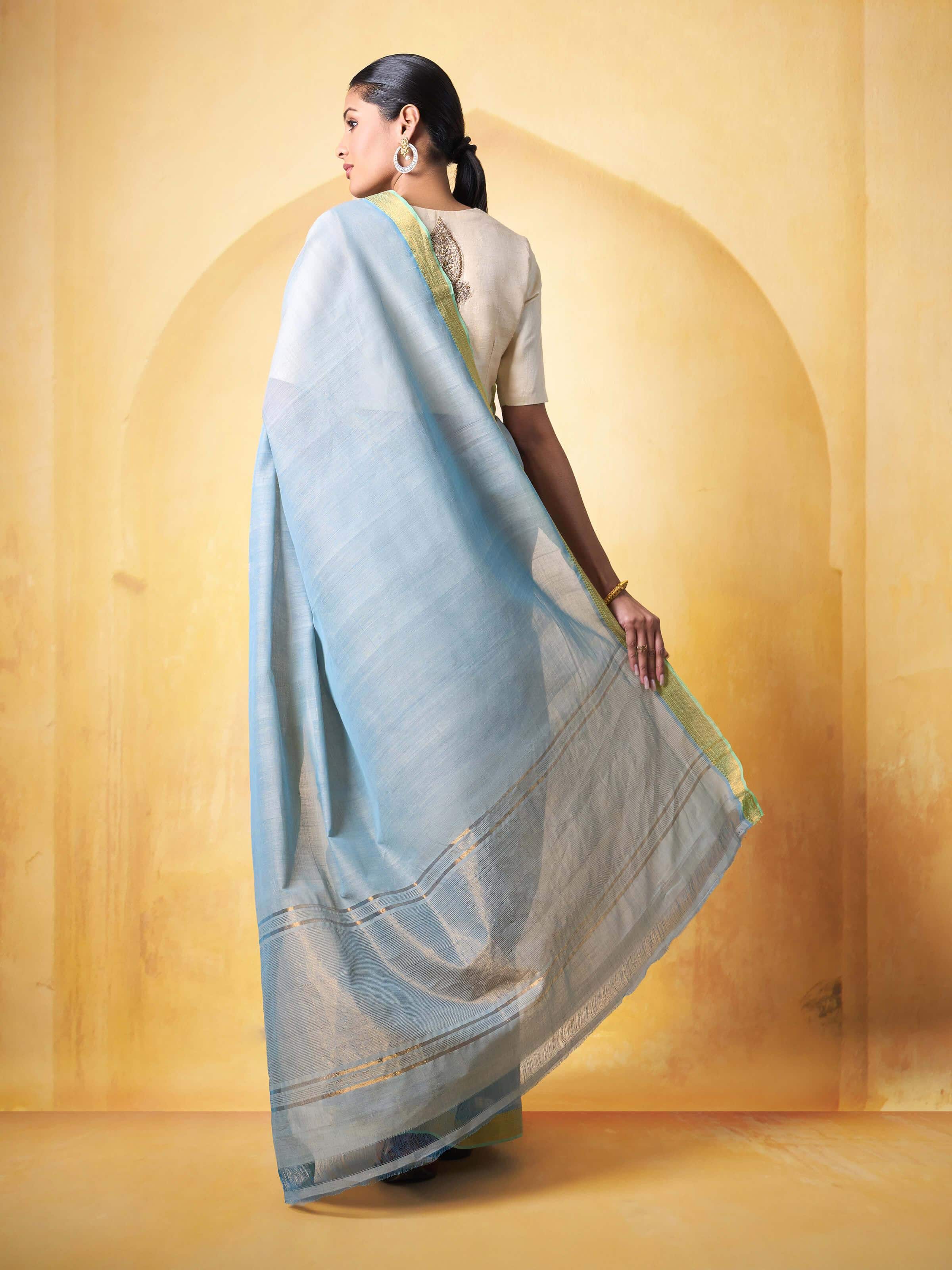 Angled view of Light Blue Cotton Mangalgiri Saree highlighting pallu and border design.