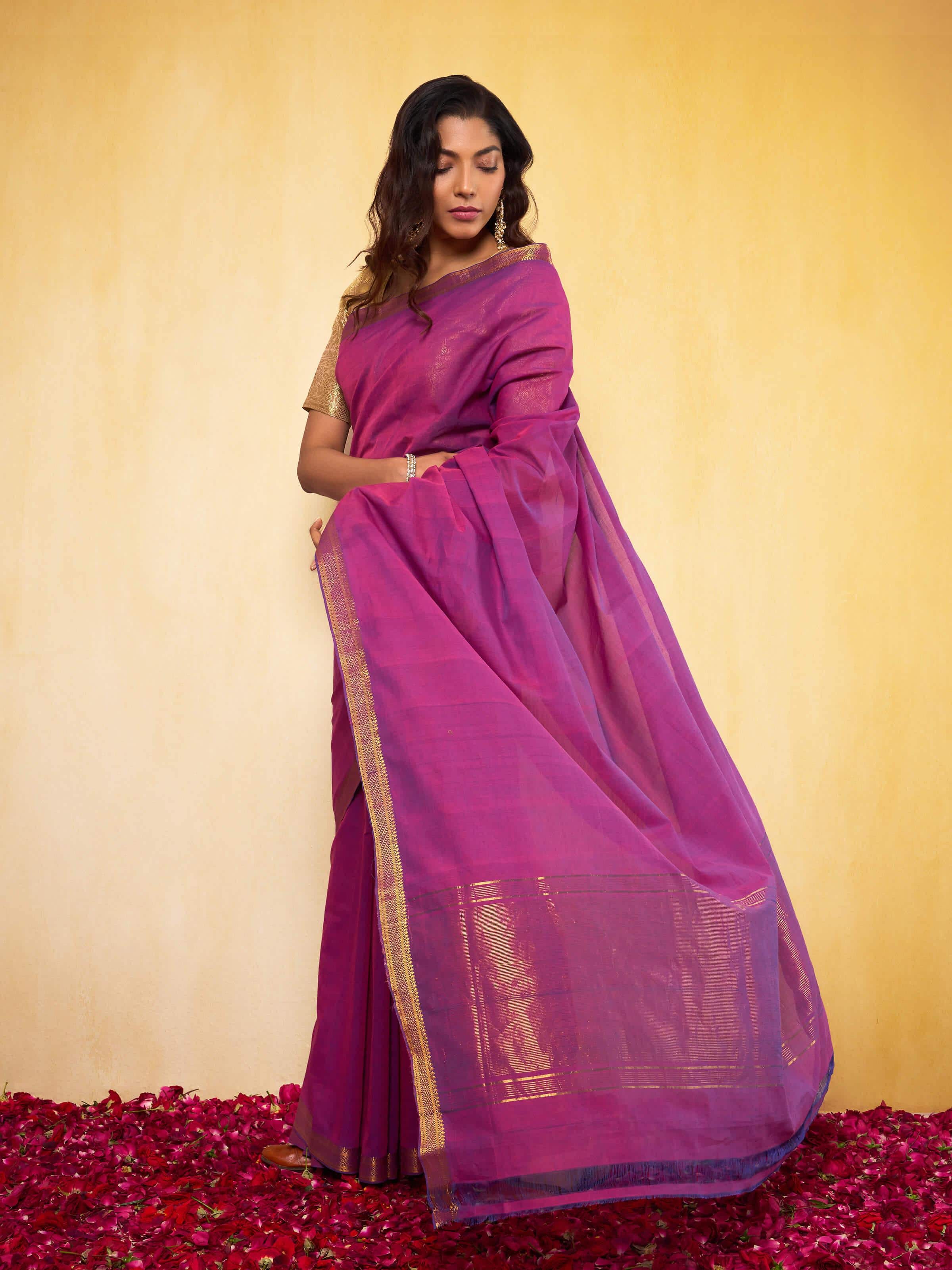 Lifestyle view of purple Mangalgiri saree styled in ethnic ensemble