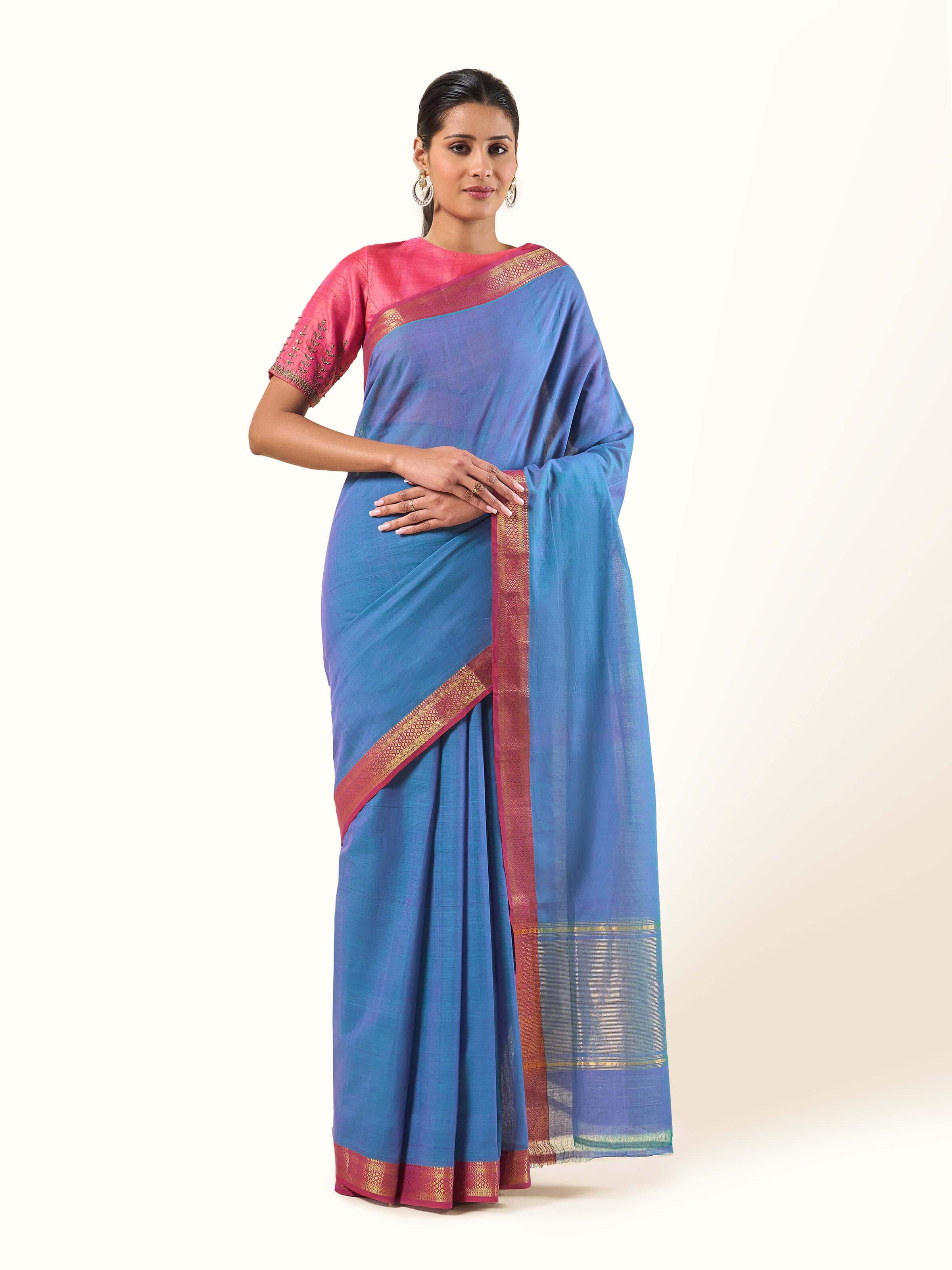 Front view of blue and pink cotton Mangalgiri saree featuring traditional striped border and fine handloom texture.
