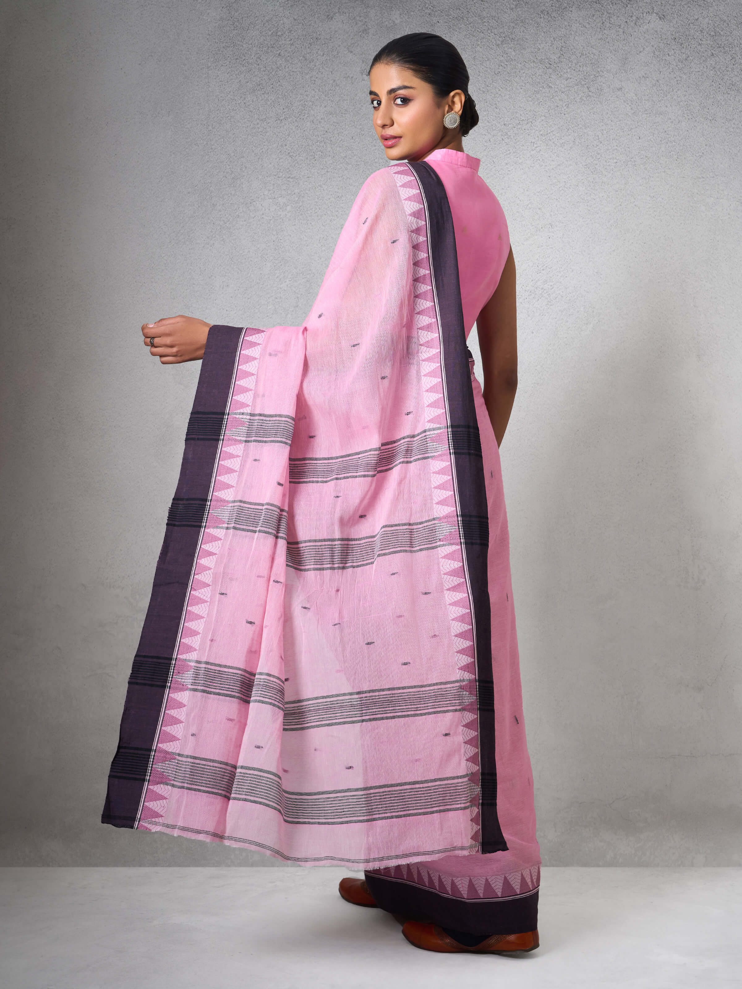 Angled shot highlighting fabric texture and design details