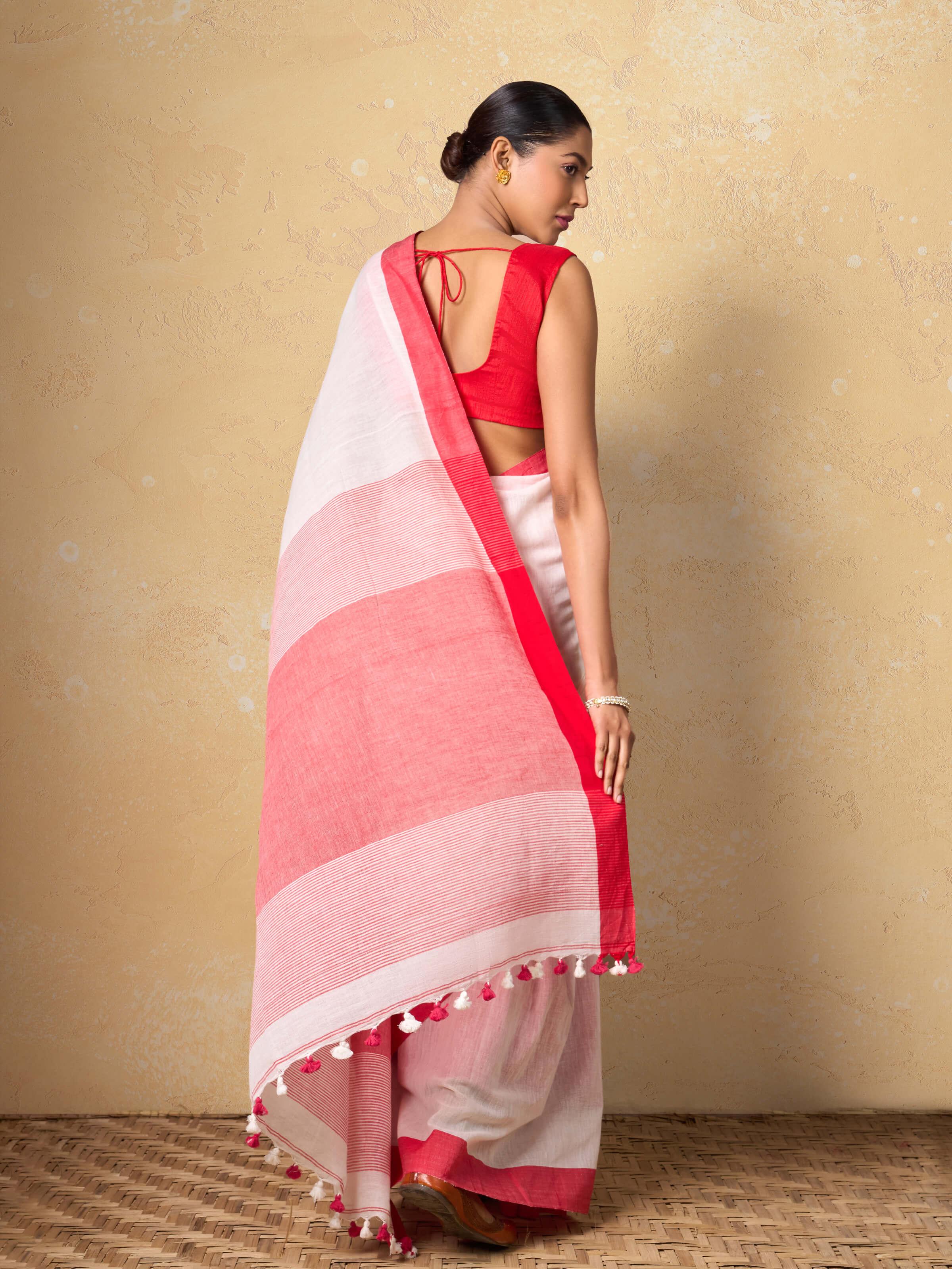 Close-up view of the detailed motifs and textures on Cotton Bengal Saree