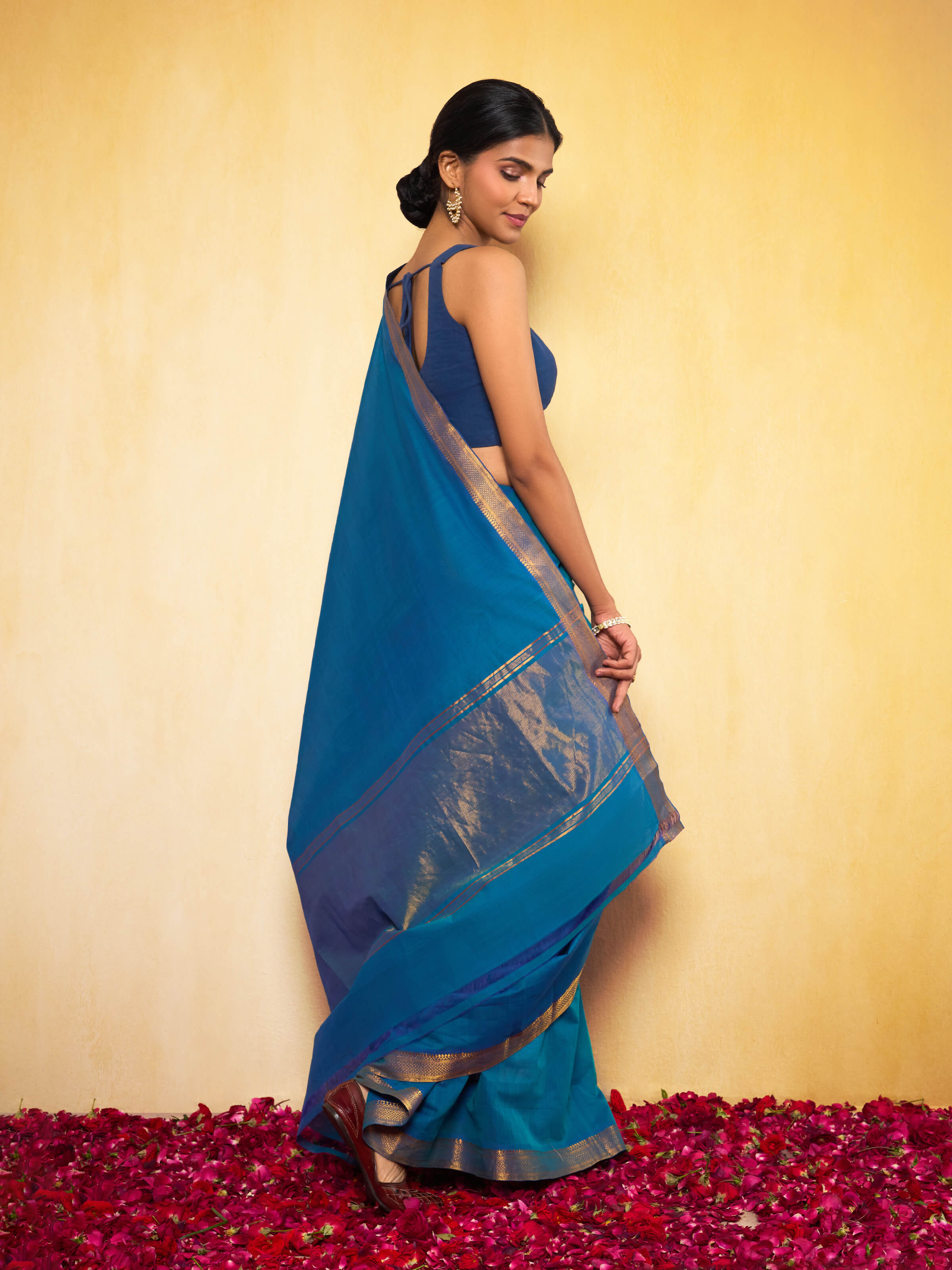 Angled view showcasing the beautiful handloom texture and contrasting palette.