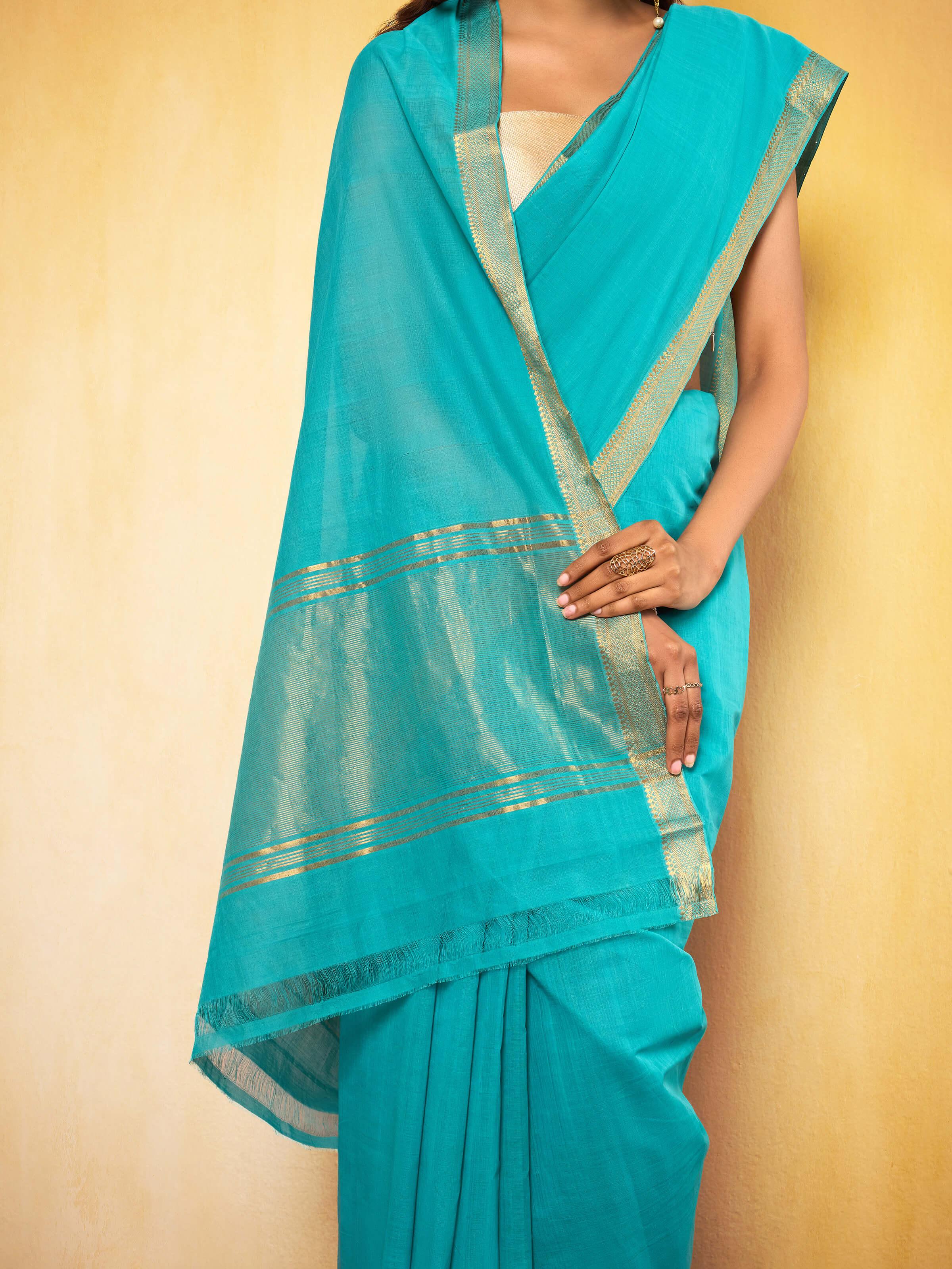 Angled view of Gossamer and Cotton Mangalgiri Saree displaying fine detailing