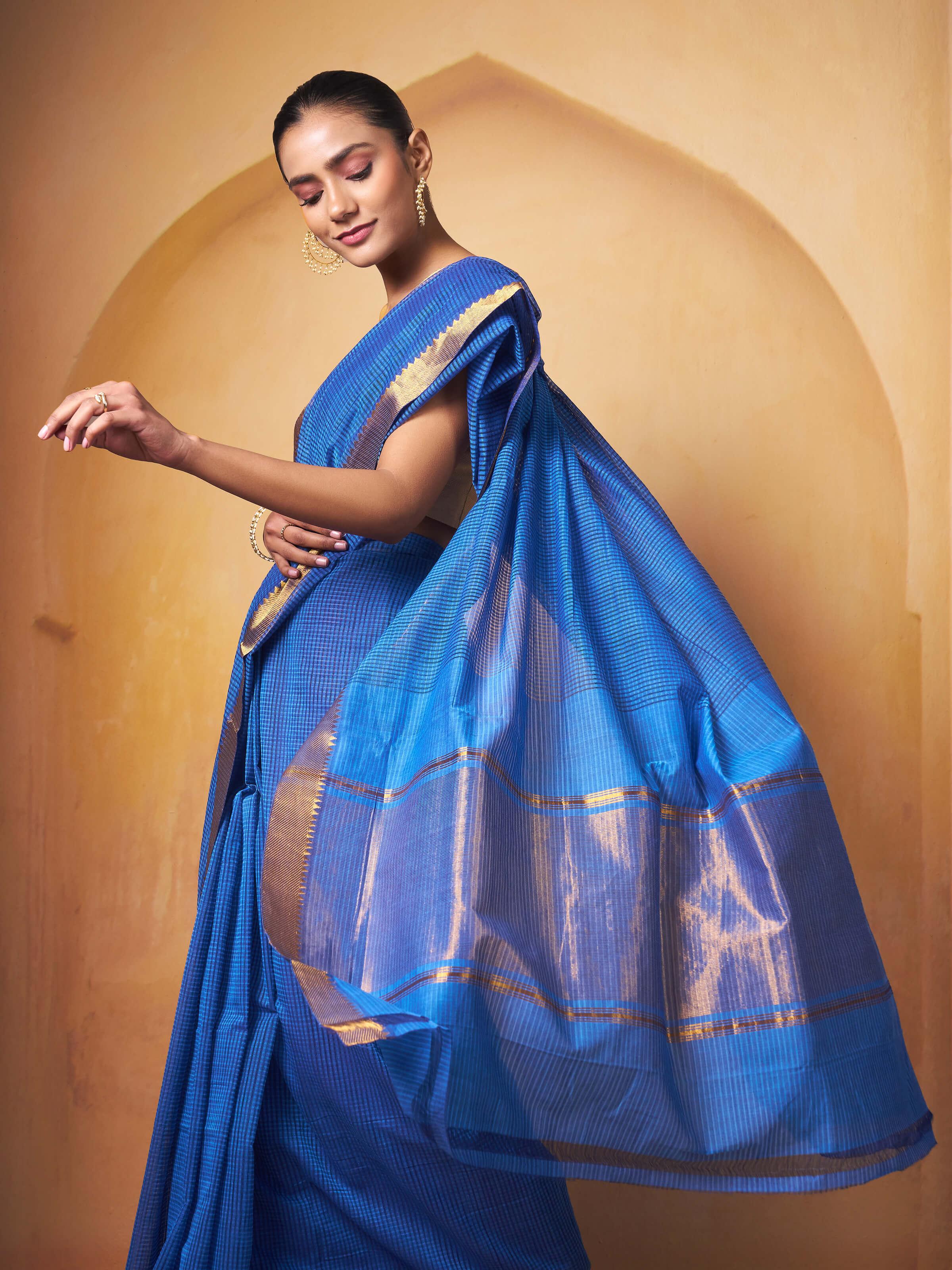 Angled view of Cotton Mangalgiri Saree displaying rich texture and handwoven patterns