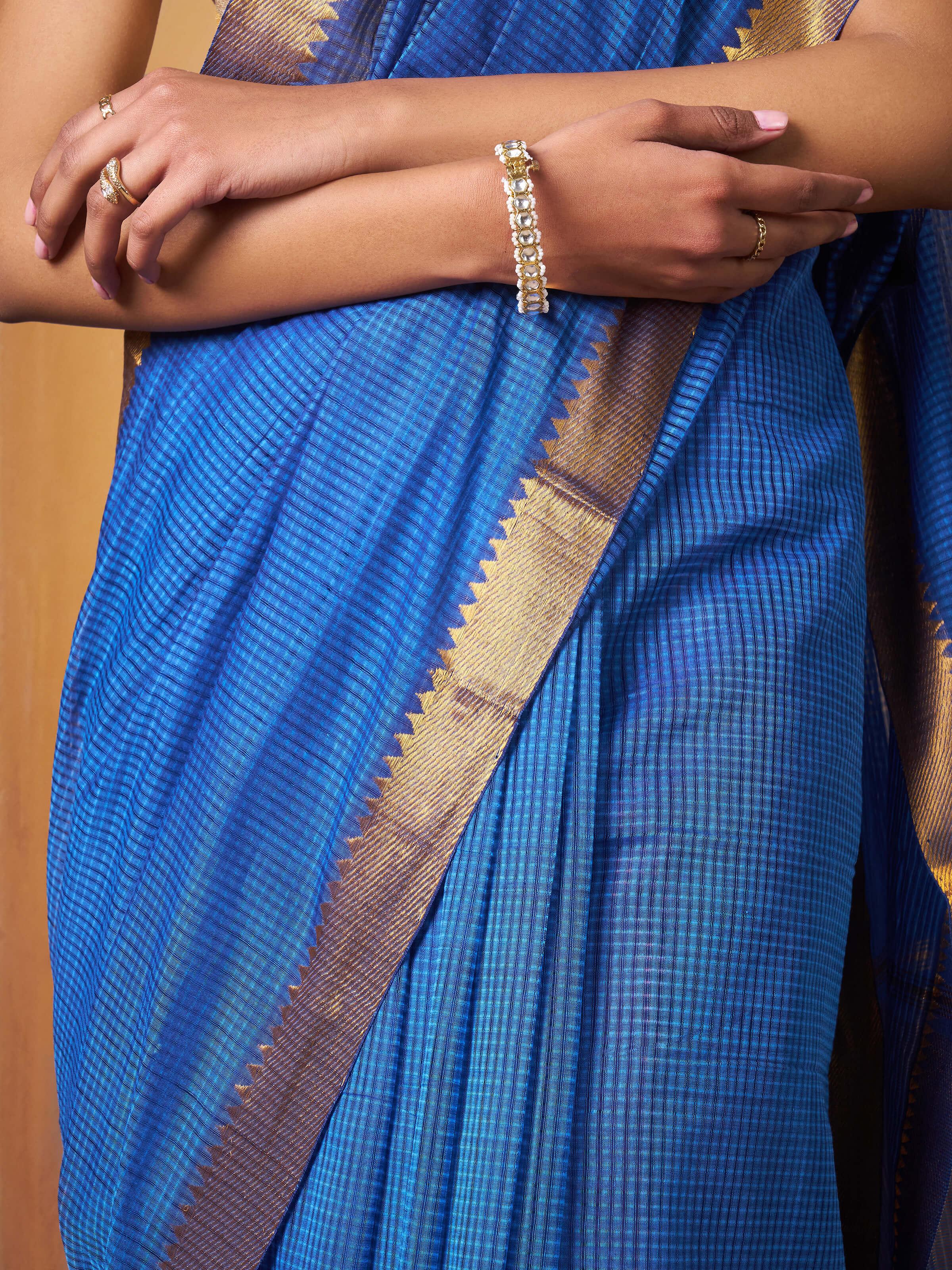 Back view of Cotton Mangalgiri Saree showcasing intricate block printed designs and craftsmanship