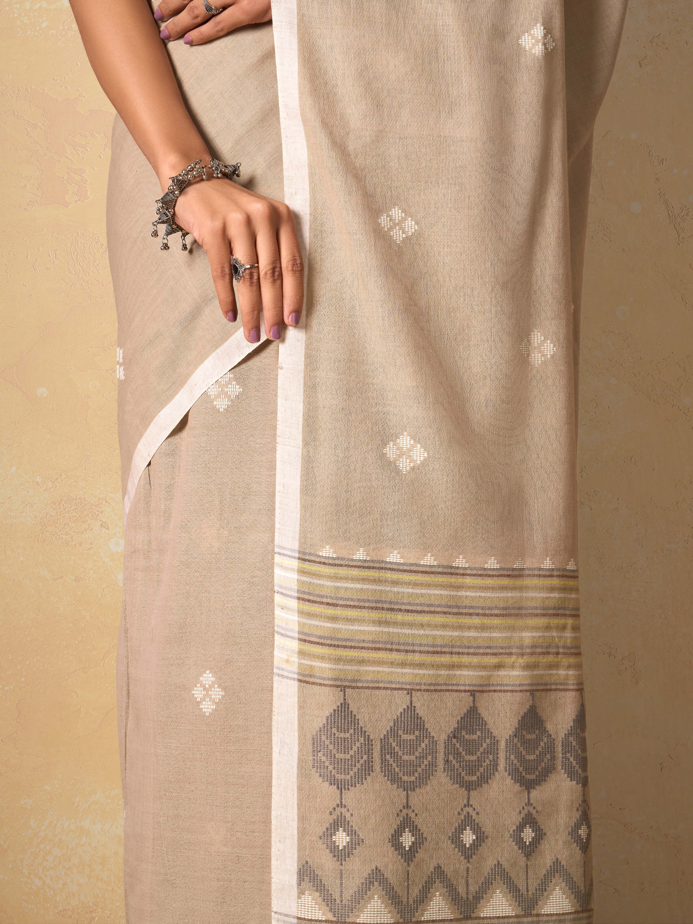 Detail shot of Cotton Extra-Weft Saree emphasizing its intricate weave pattern