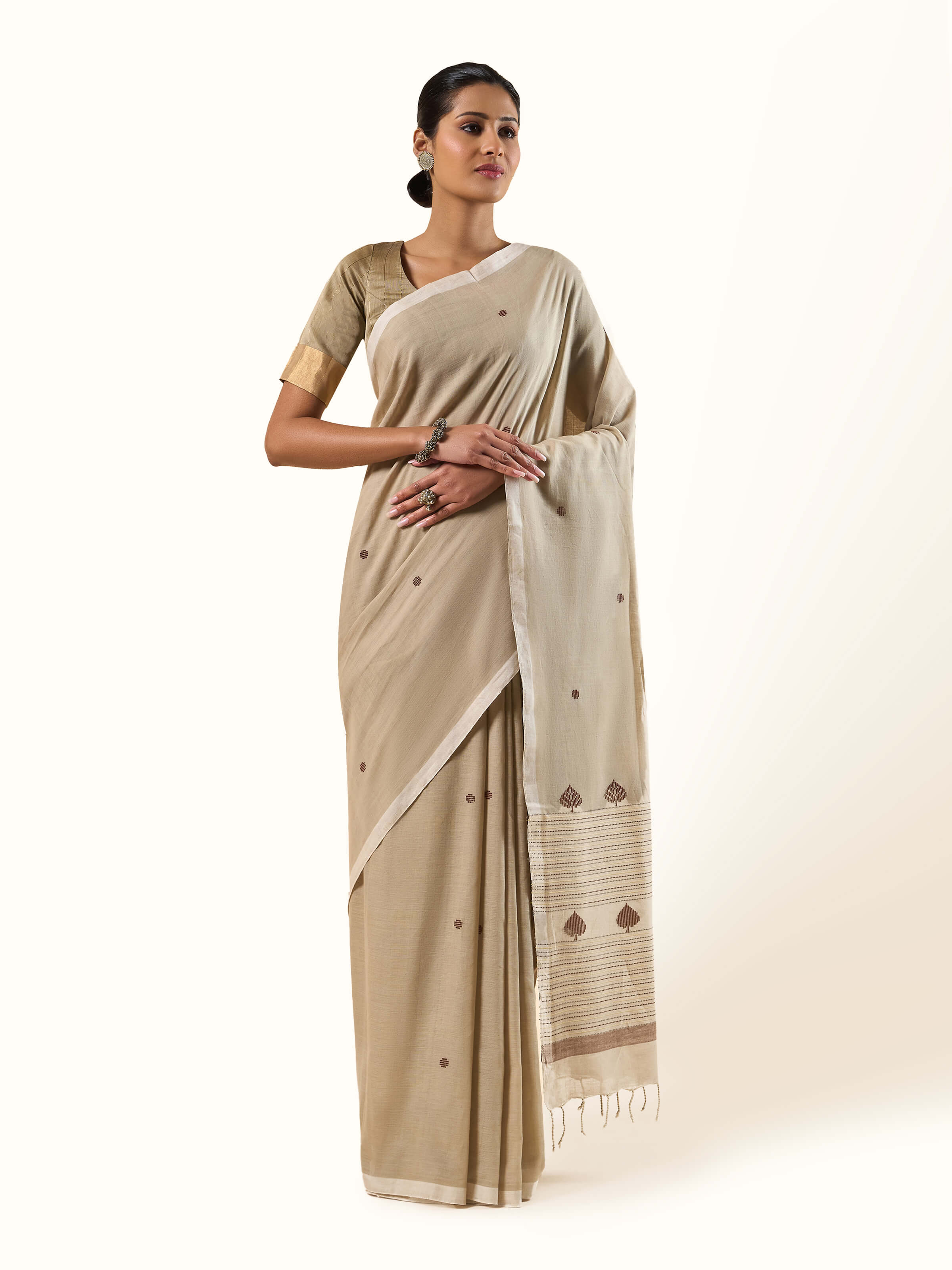 Front view of Cotton Extra-Weft Saree showcasing intricate weaving patterns