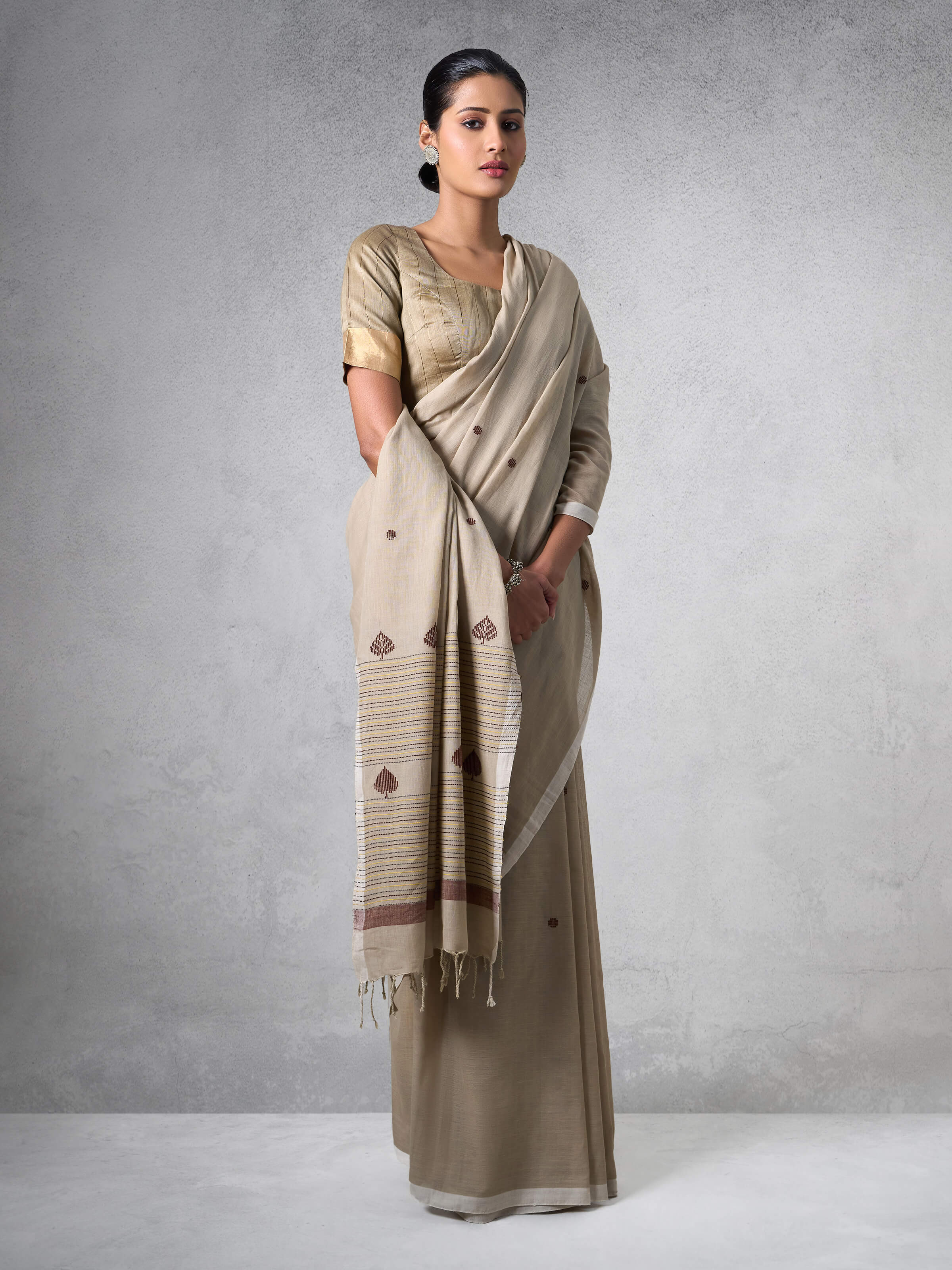 Close-up of detailed designs on Cotton Extra-Weft Saree highlighting craftsmanship