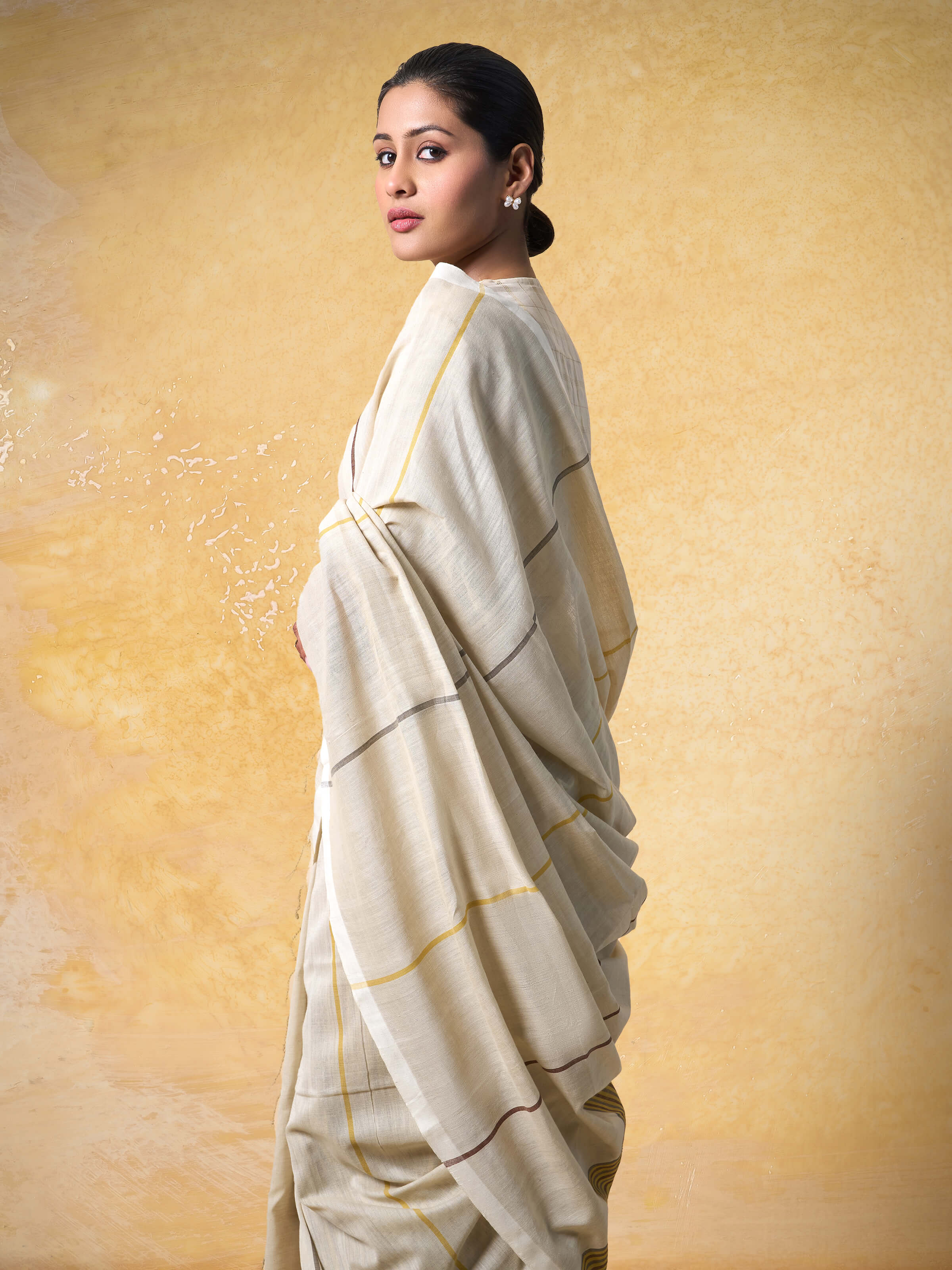 Side view of Cotton Extra-Weft Saree highlighting its lightweight fabric and traditional appeal