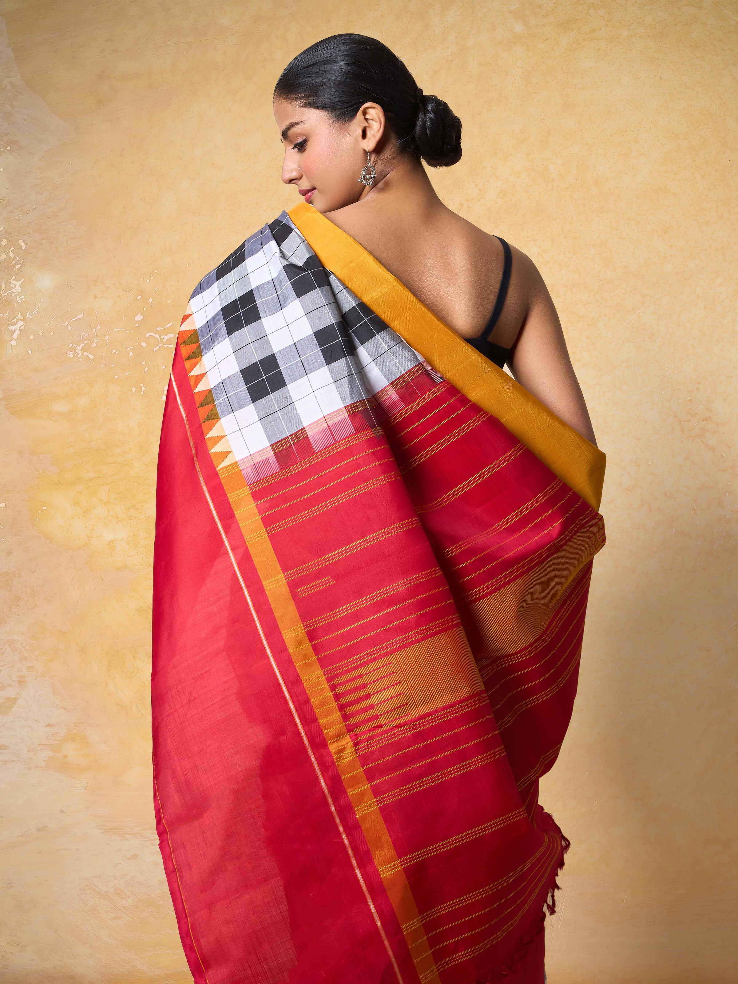 Angled view of Silk Kancheepuram Saree highlighting its traditional craftsmanship and silk texture
