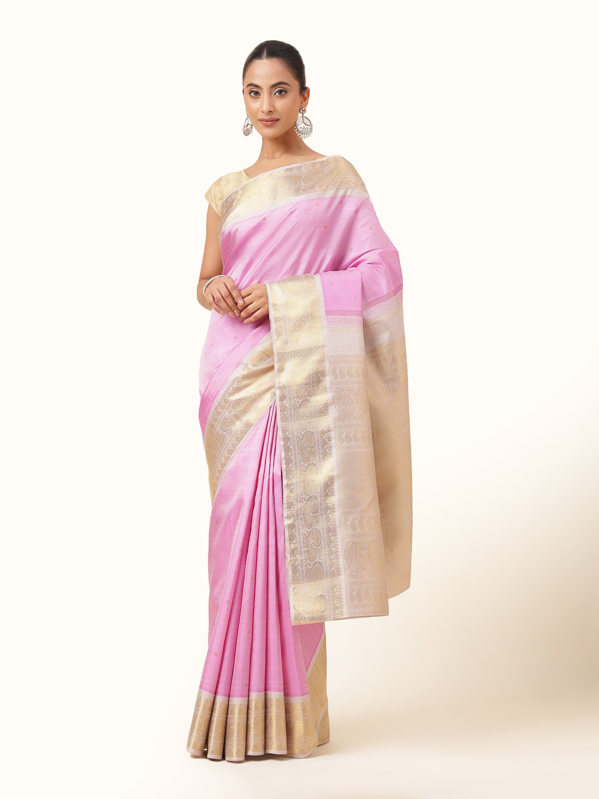 Pink Kancheepuram silk saree with golden zari border