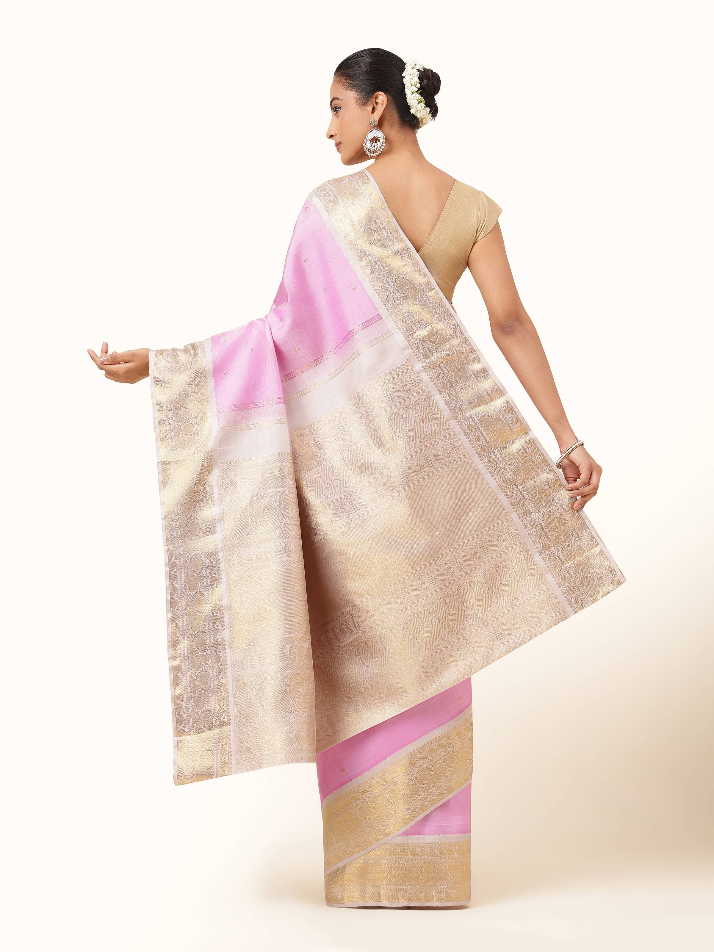 Back view emphasizing rich pink tone and traditional border design