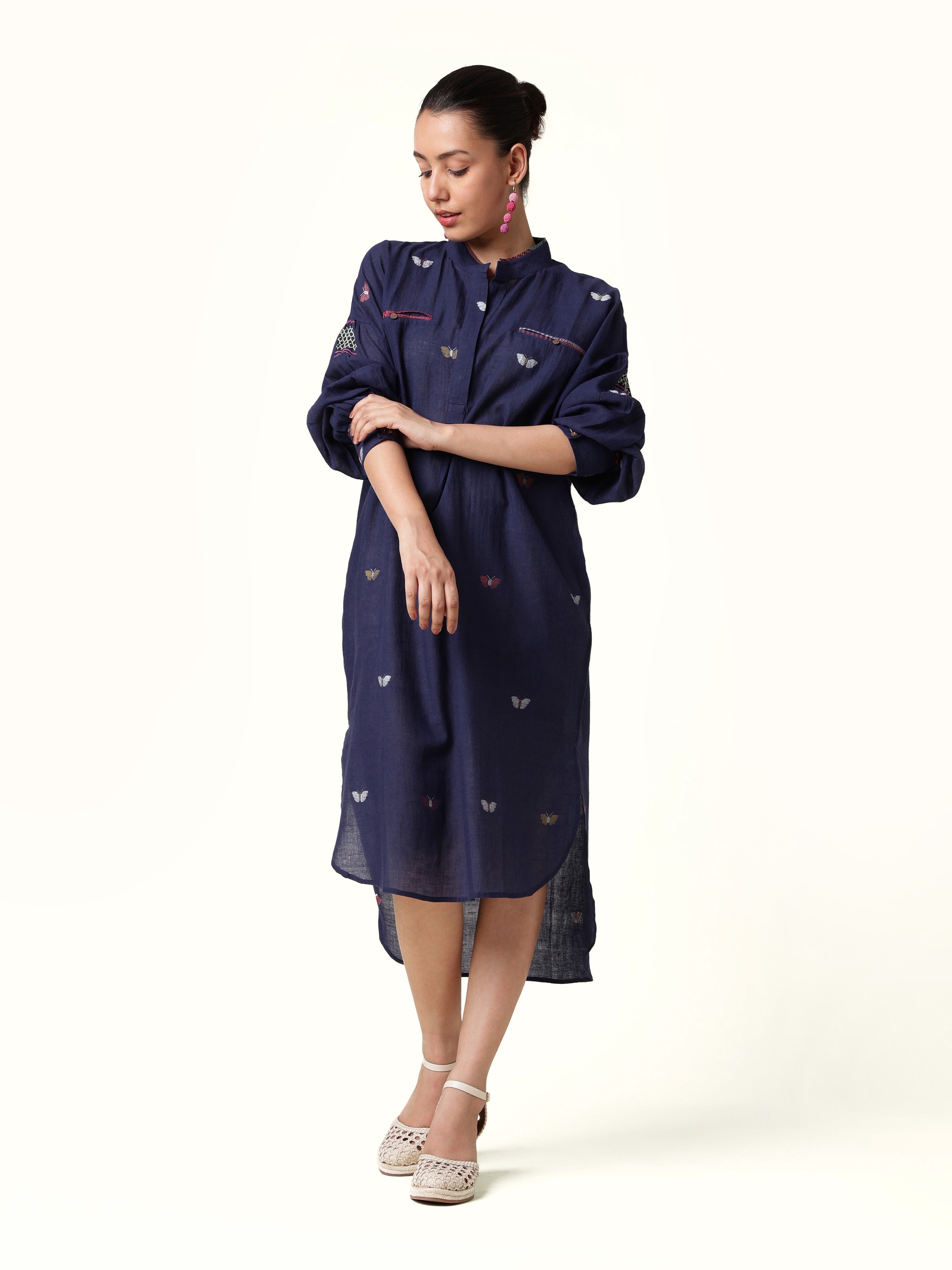 Front view showcasing the soft blue cotton shirt with Bengal Jamdani weaving details.