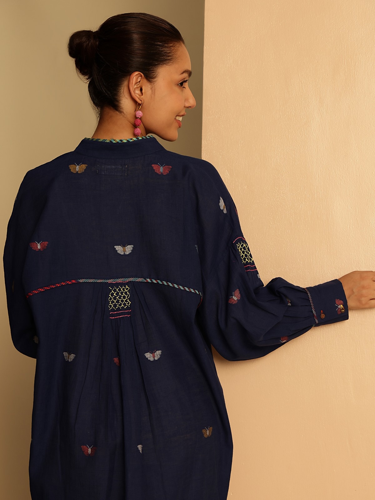 Alternate lifestyle view that reveals the side profile and charming slit details.