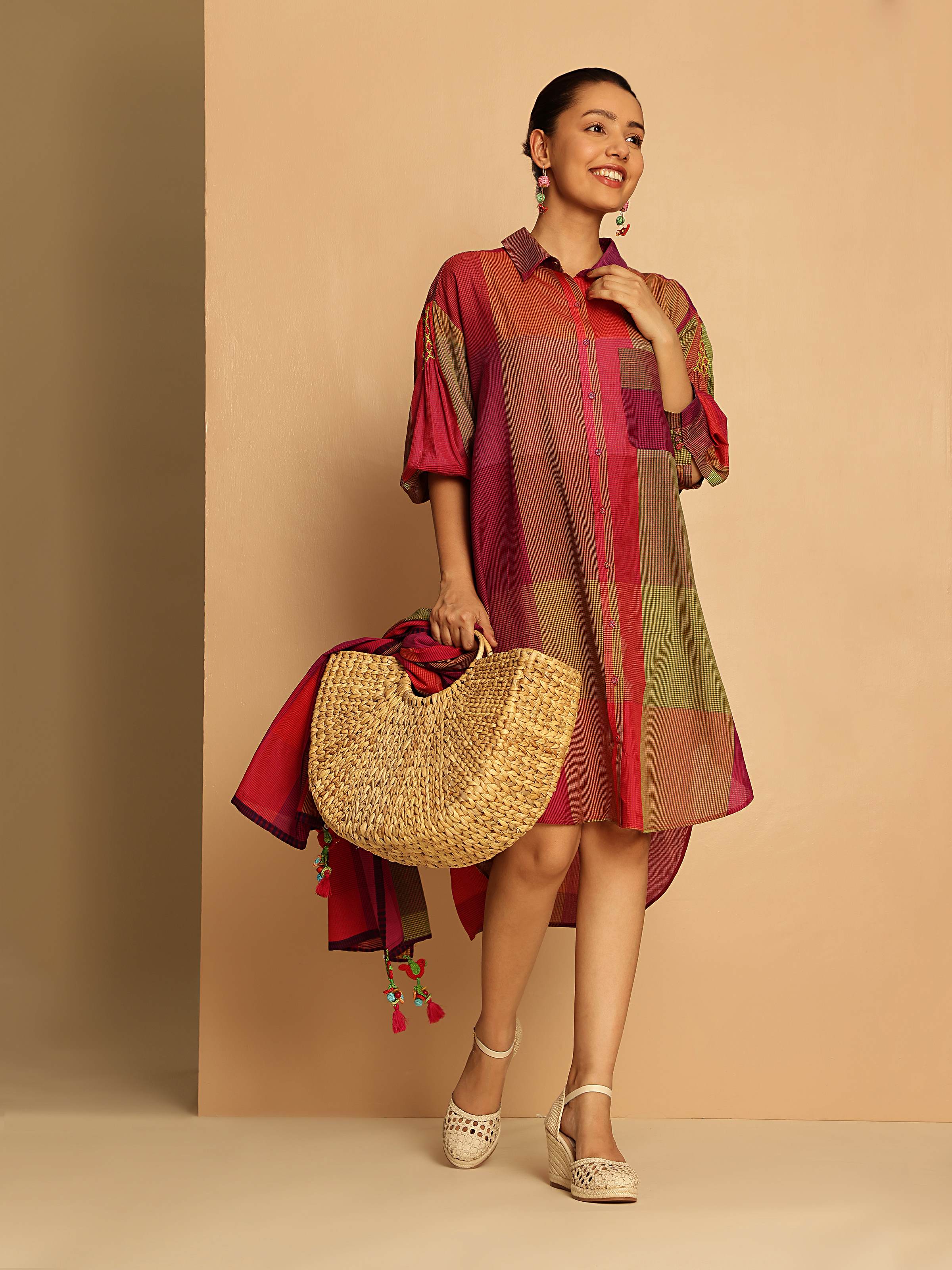 Lifestyle shot showing the graceful fall and lightness of the silk cotton blend, perfect for warm days.