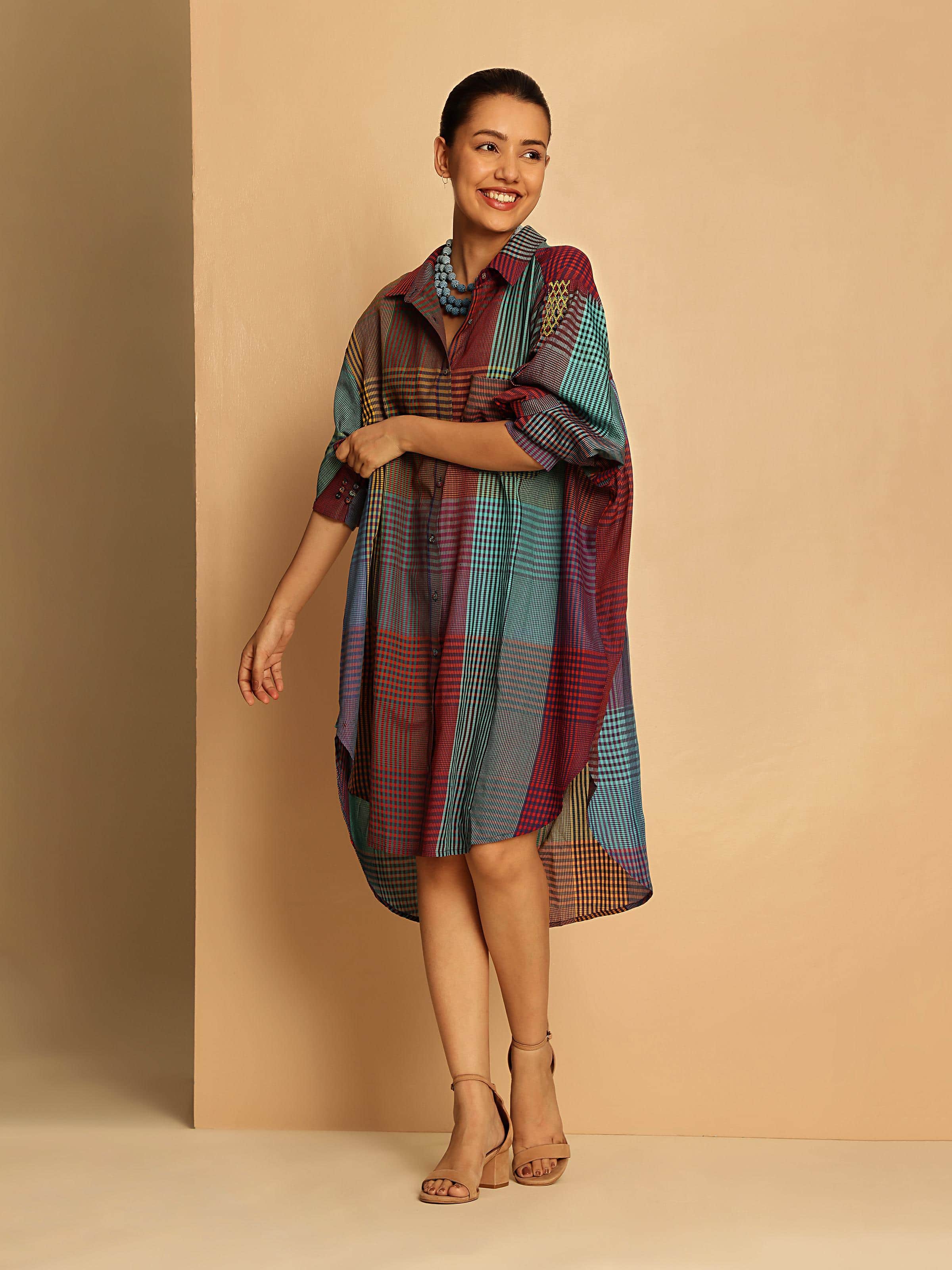 Blue silk cotton Bengal Jamdani long shirt lifestyle view draped elegantly on model highlighting fabric texture