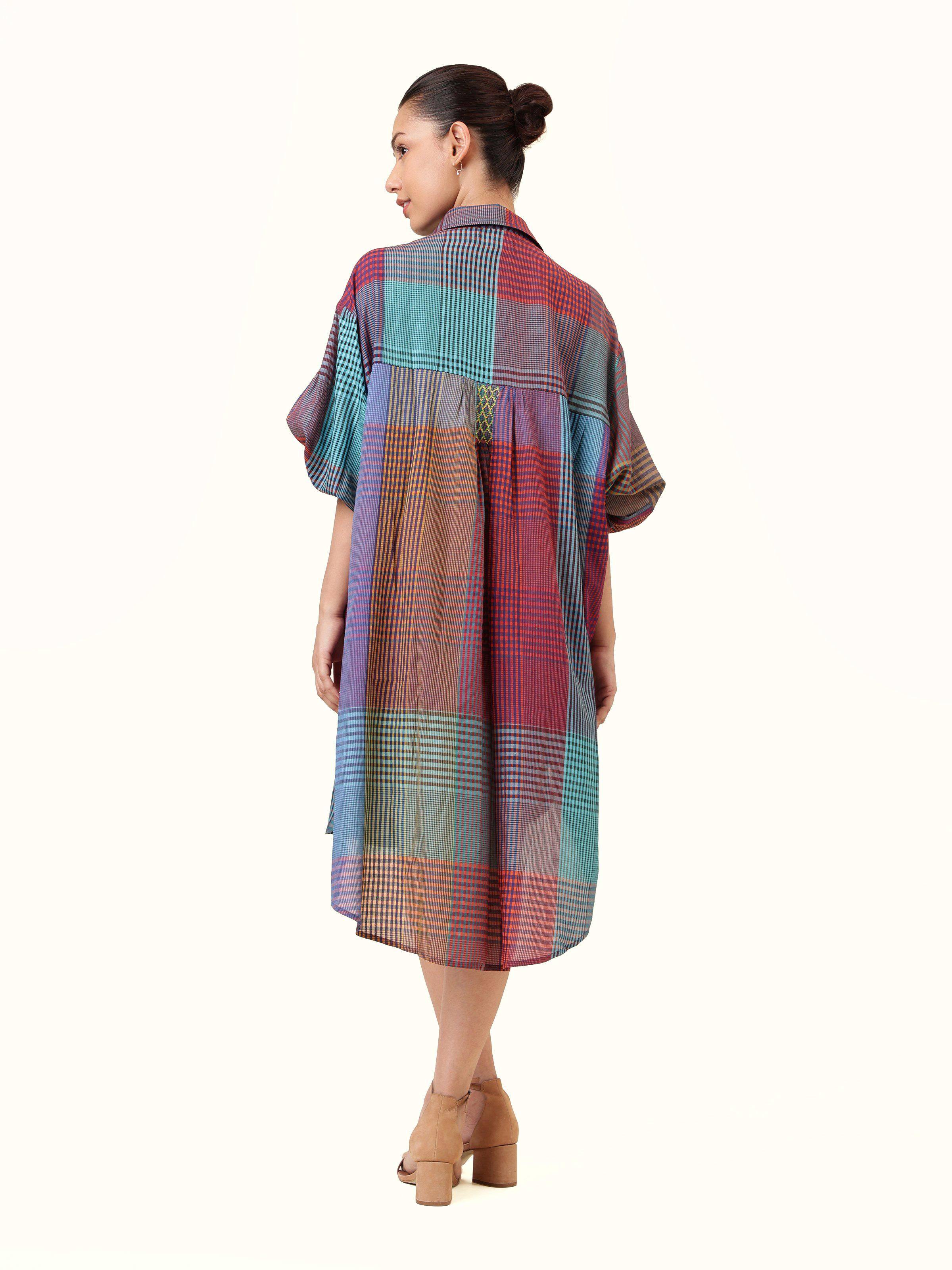 Blue silk cotton Bengal Jamdani long shirt back view showing shirt’s tailored fit and pattern continuity