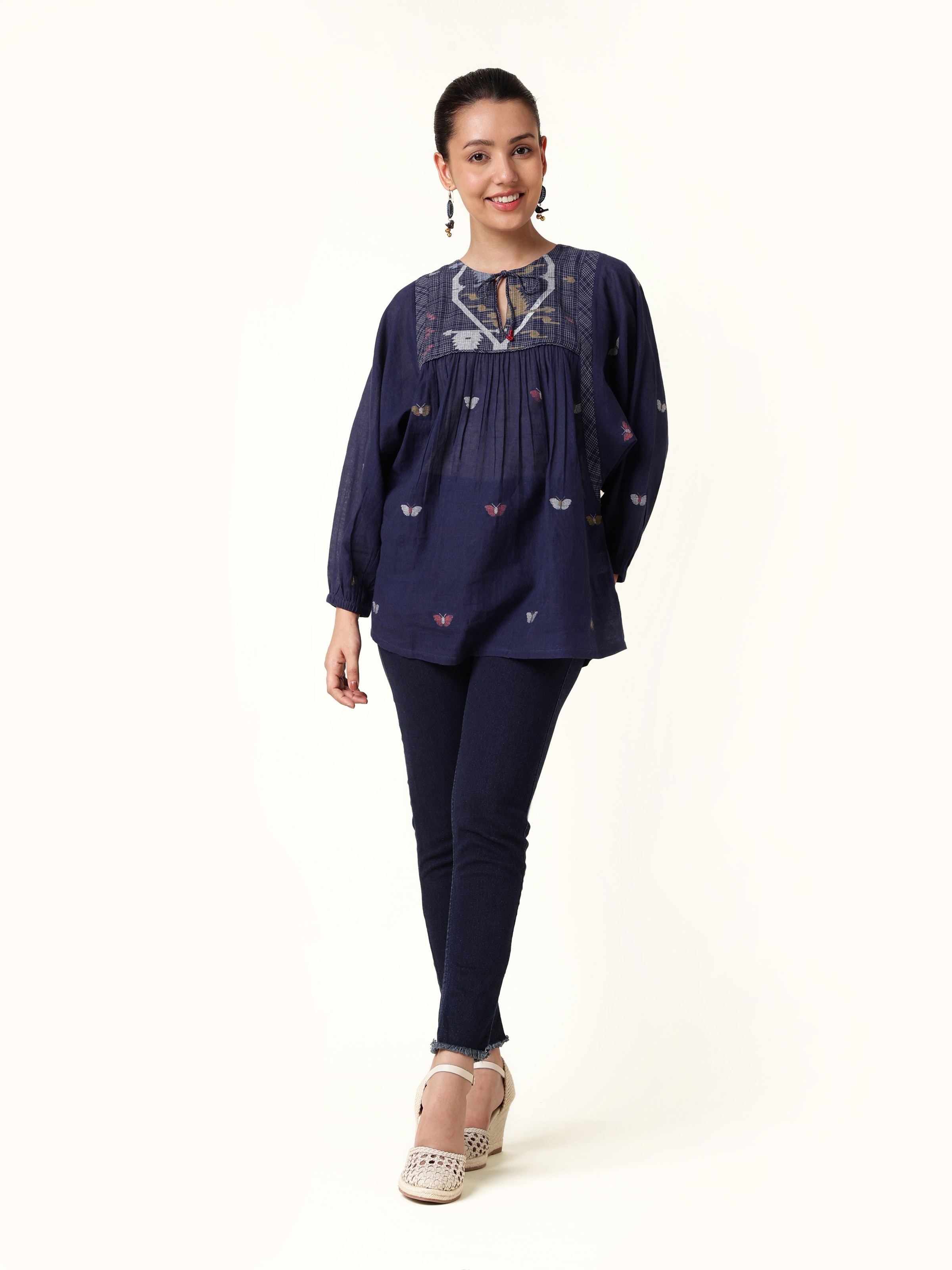Front view of blue cotton Bengal Jamdani bohemian top with handwoven patterns.