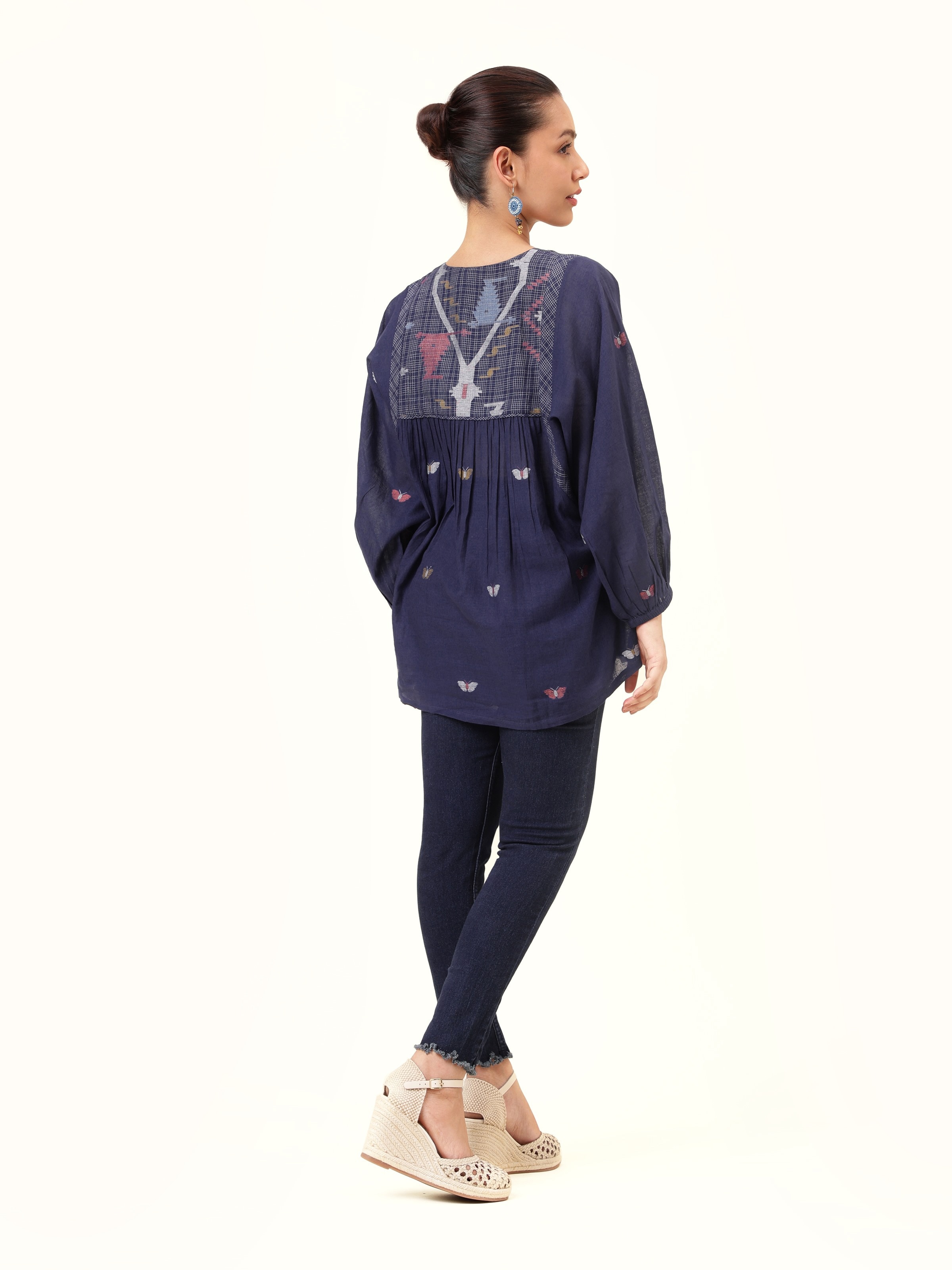 Back view of blue Bengal Jamdani bohemian cotton top showcasing minimal design.