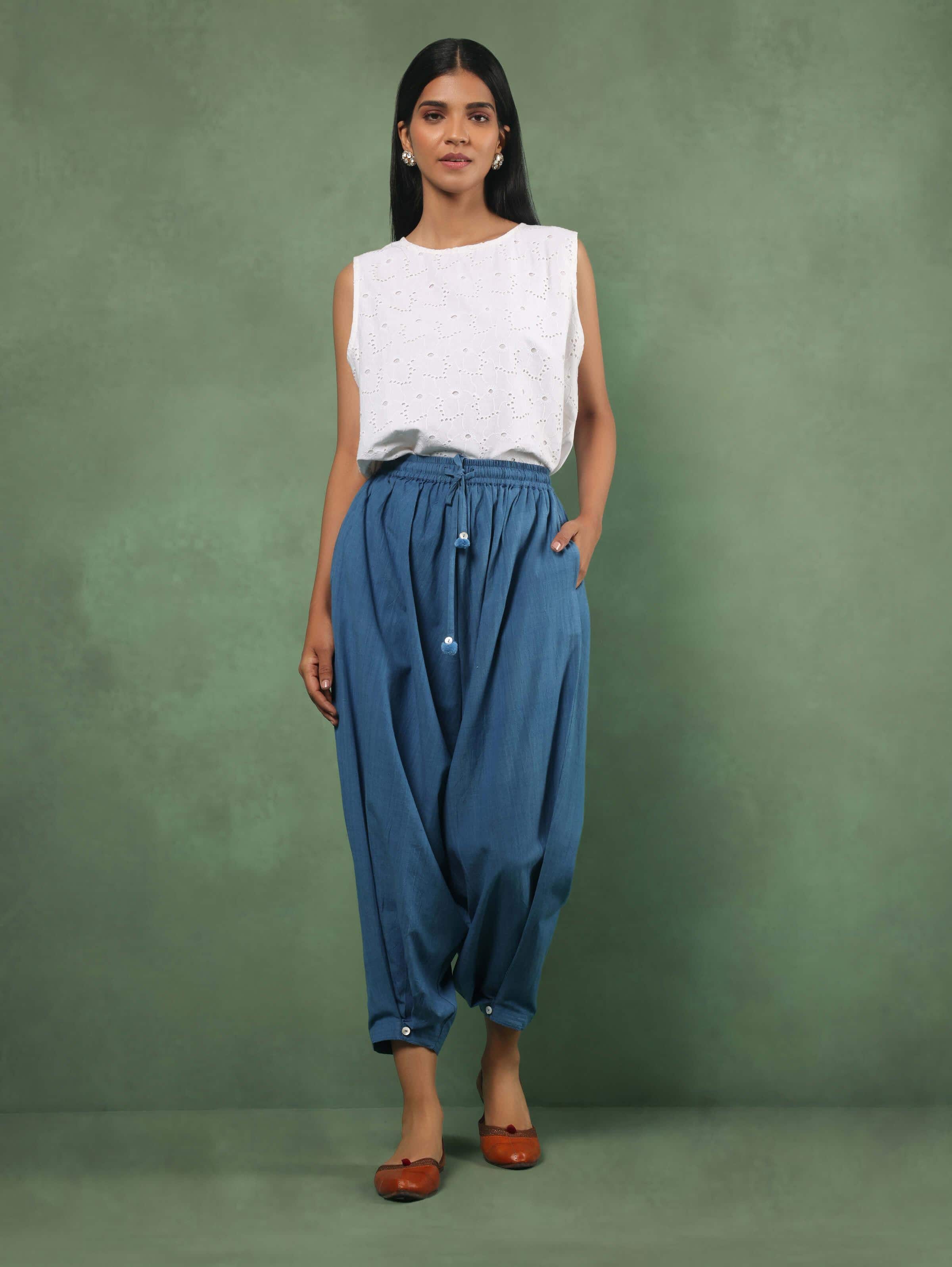 Lifestyle view of indigo handloom harem pants styled with kurta for a casual ethnic look