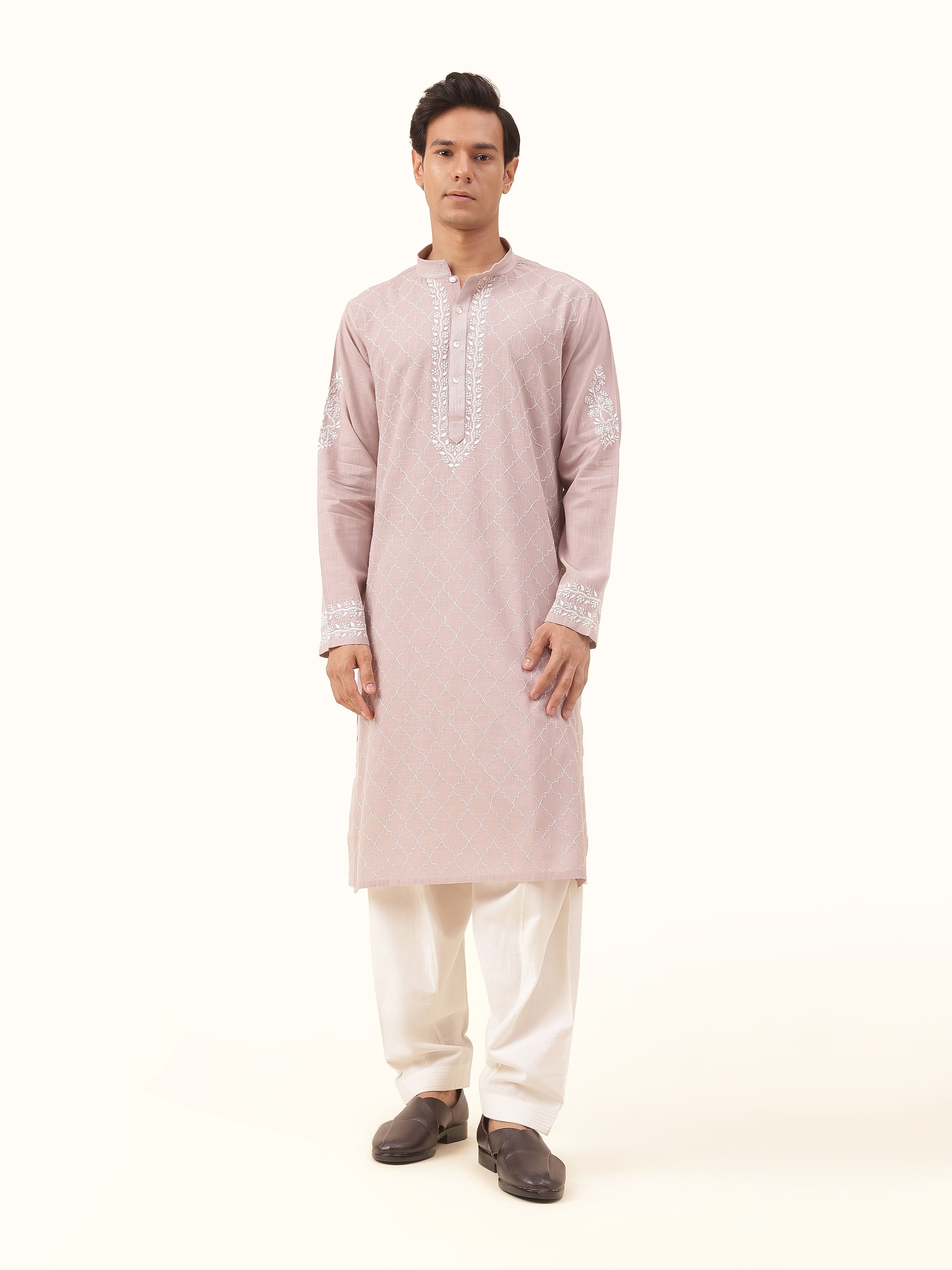 Front view of grey cotton Chikankari long kurta highlighting intricate hand embroidery.