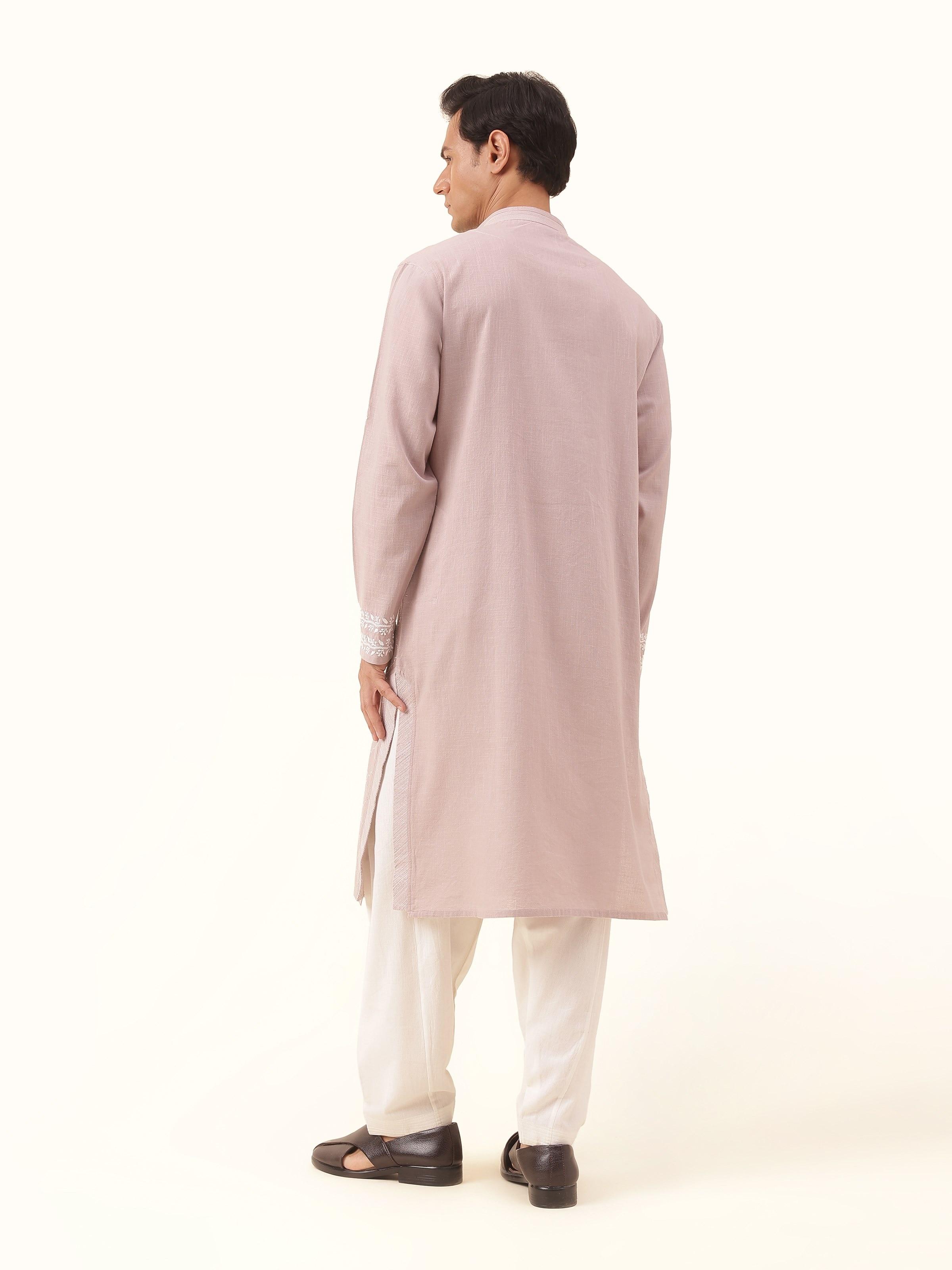 Back view highlighting length and fine finishing of the grey Chikankari kurta.