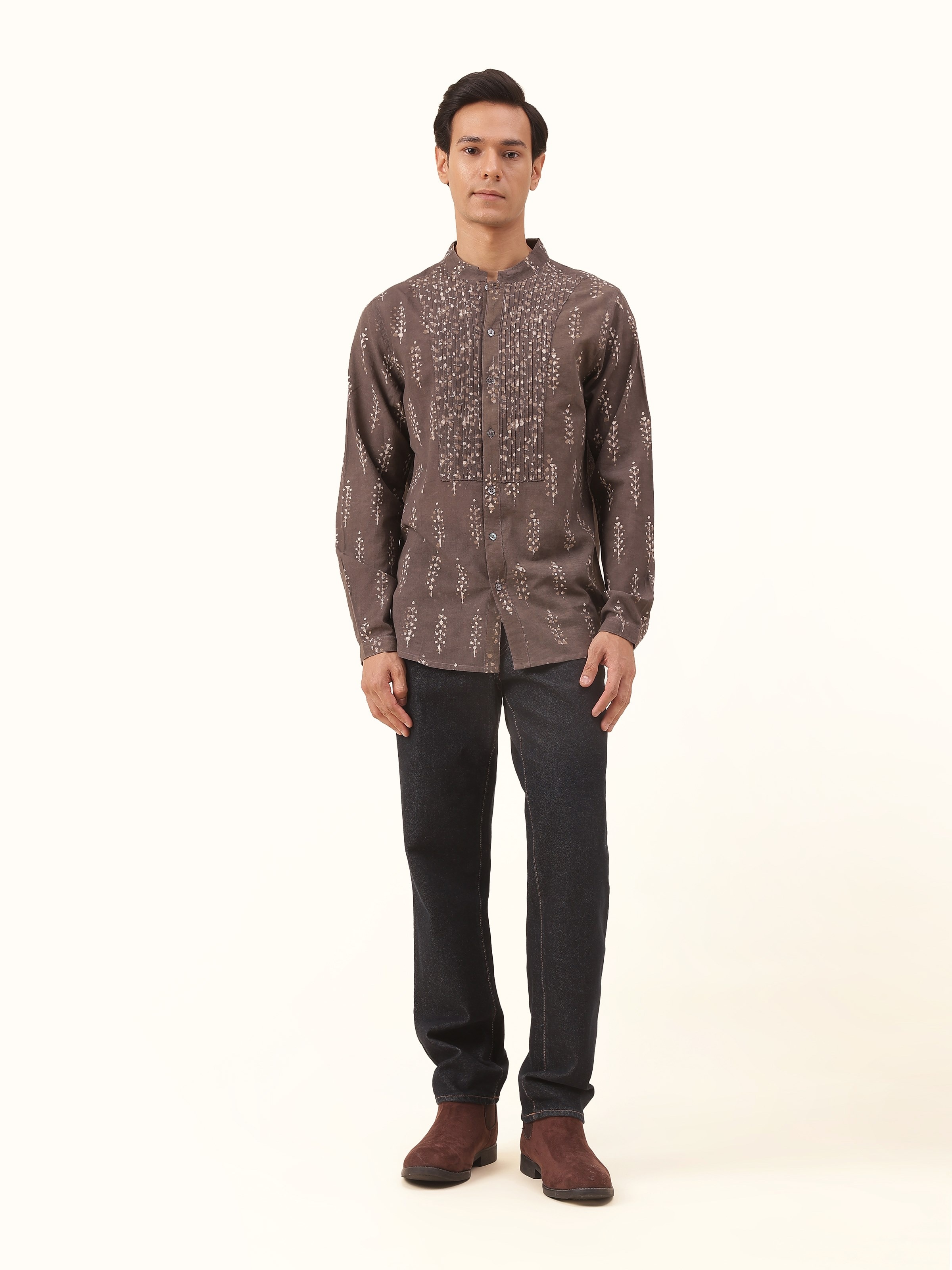 Front view of grey cotton Chikankari shirt displaying intricate hand embroidery and soft cotton fabric.