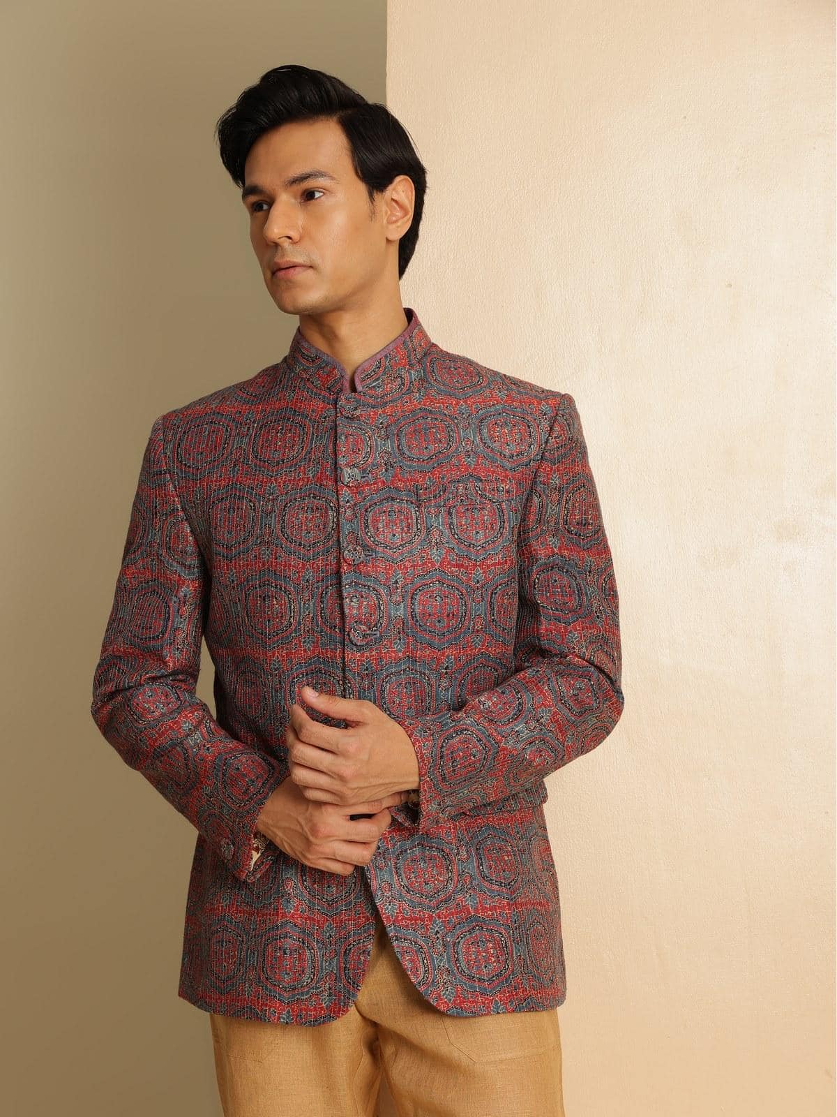 Side lifestyle view of indigo silk Ajrakh Bandhgala jacket highlighting tailored silhouette