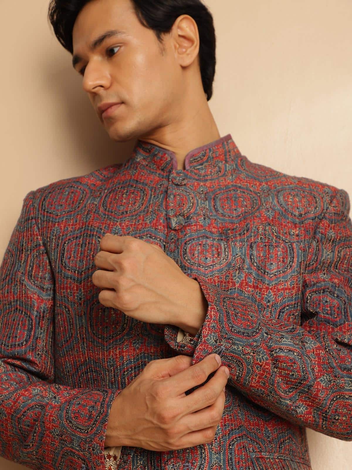 Close-up detail of indigo silk Ajrakh block printed Bandhgala jacket showcasing traditional patterns
