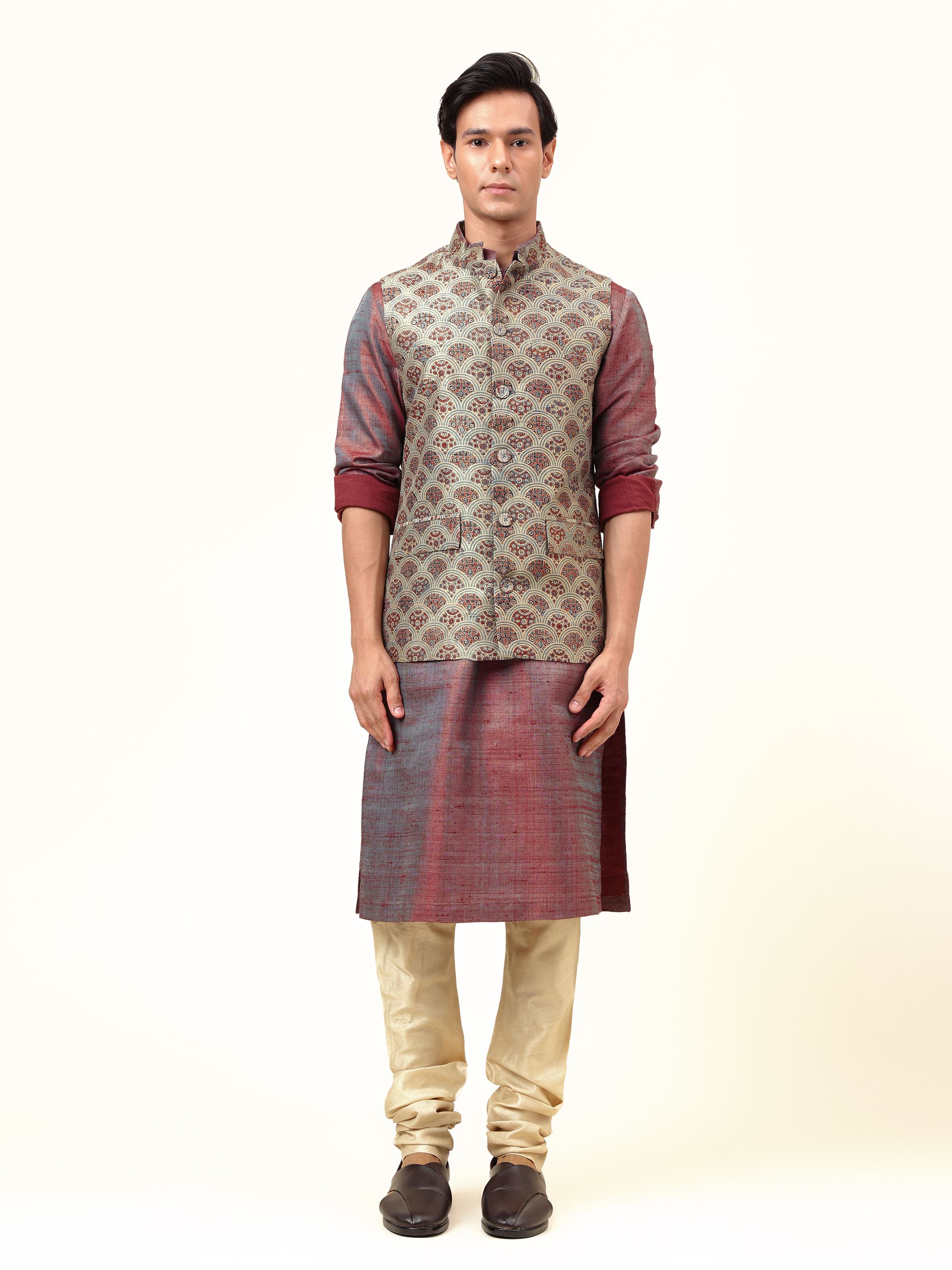 Front view of the Indigo Silk Ajrakh Block Printed Sleeveless Jacket showcasing its bold patterns and rich hue