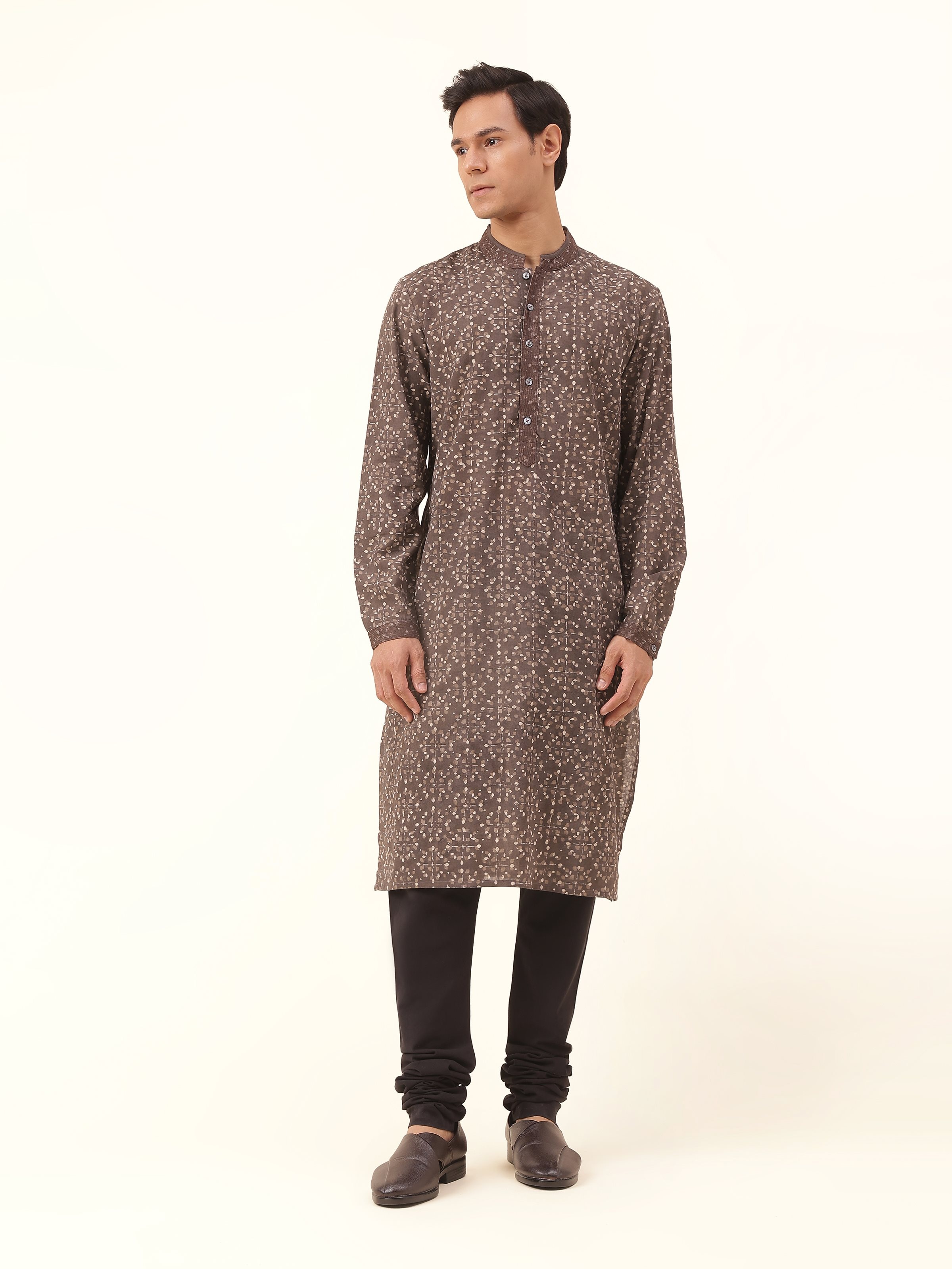 Front view of grey cotton long kurta featuring traditional Dabu block prints and straight silhouette.