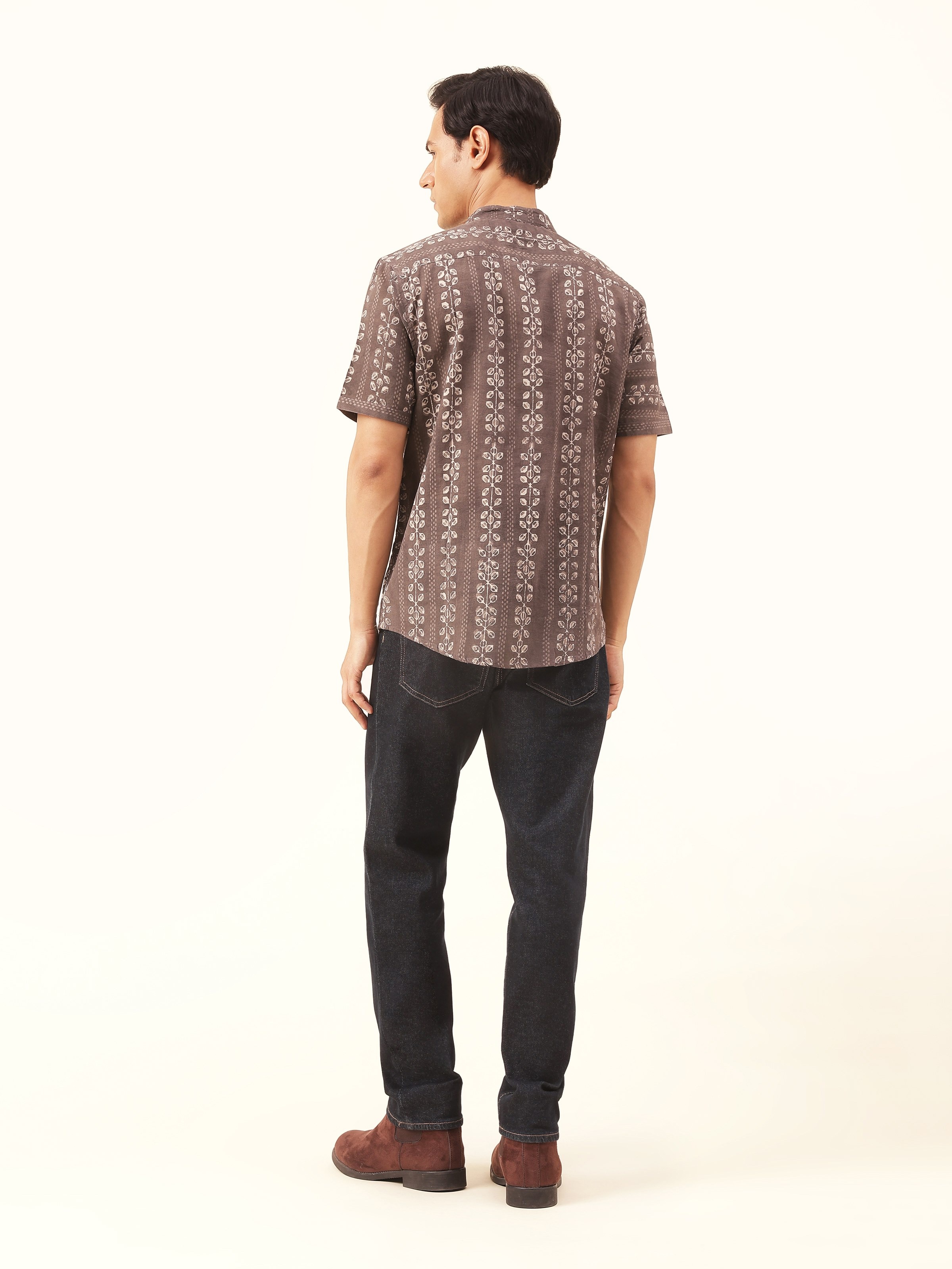Back view of grey cotton Dabu block printed shirt showing yoke and back seam.