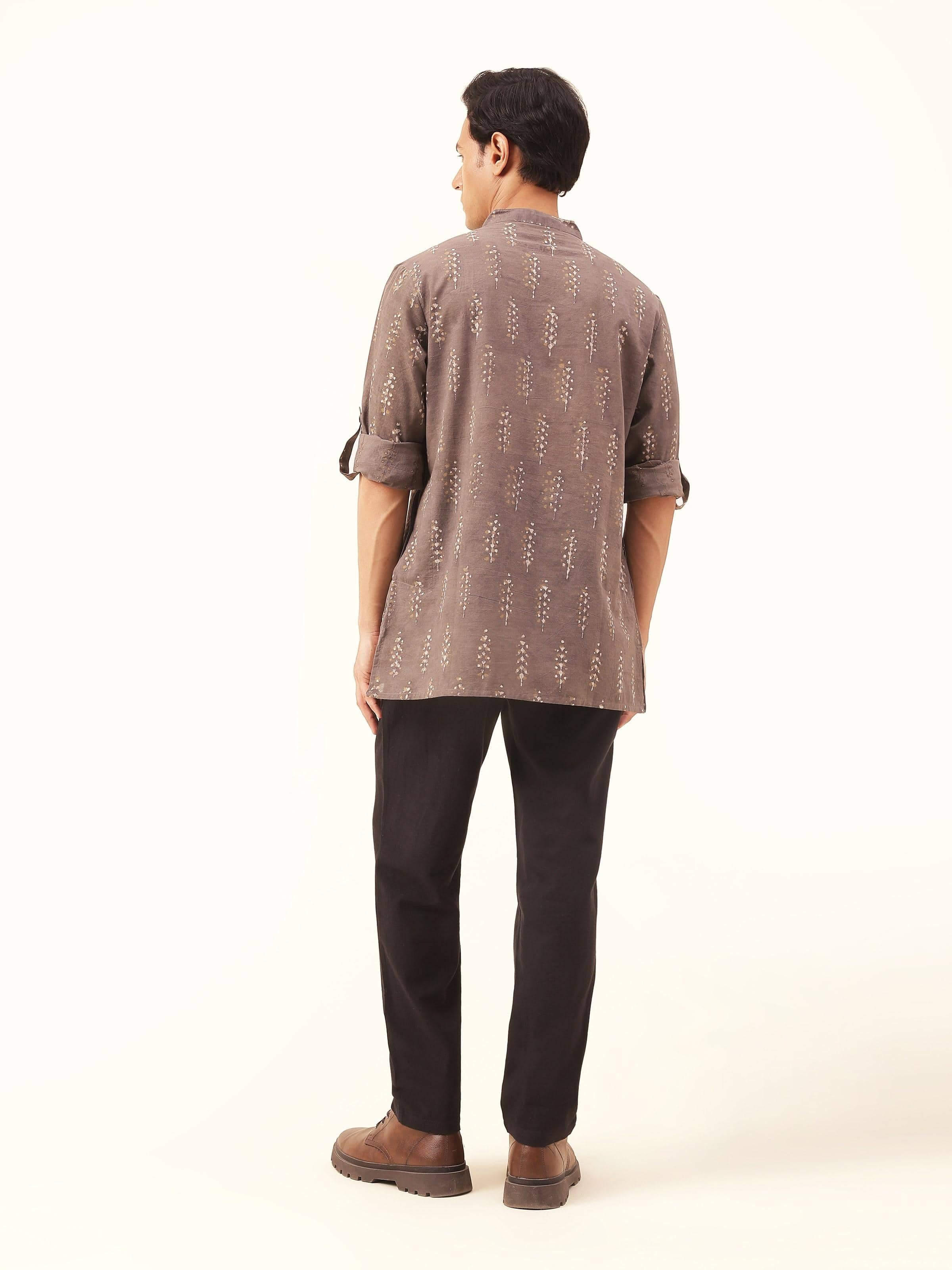 Back view showcasing the neat tailoring and timeless prints.