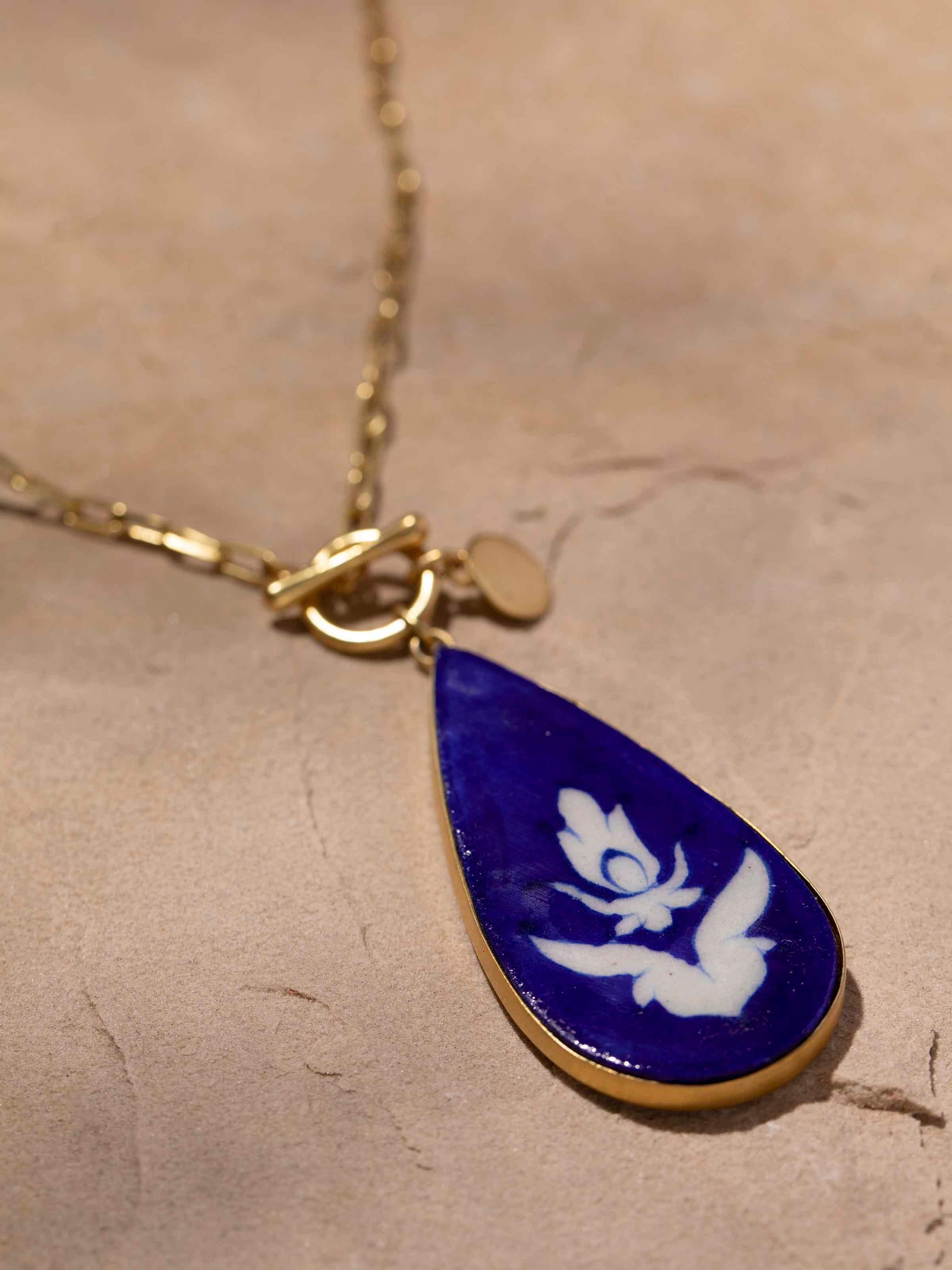 Detailed front view of Blue Pottery long necklace highlighting its unique design and vibrant pottery details