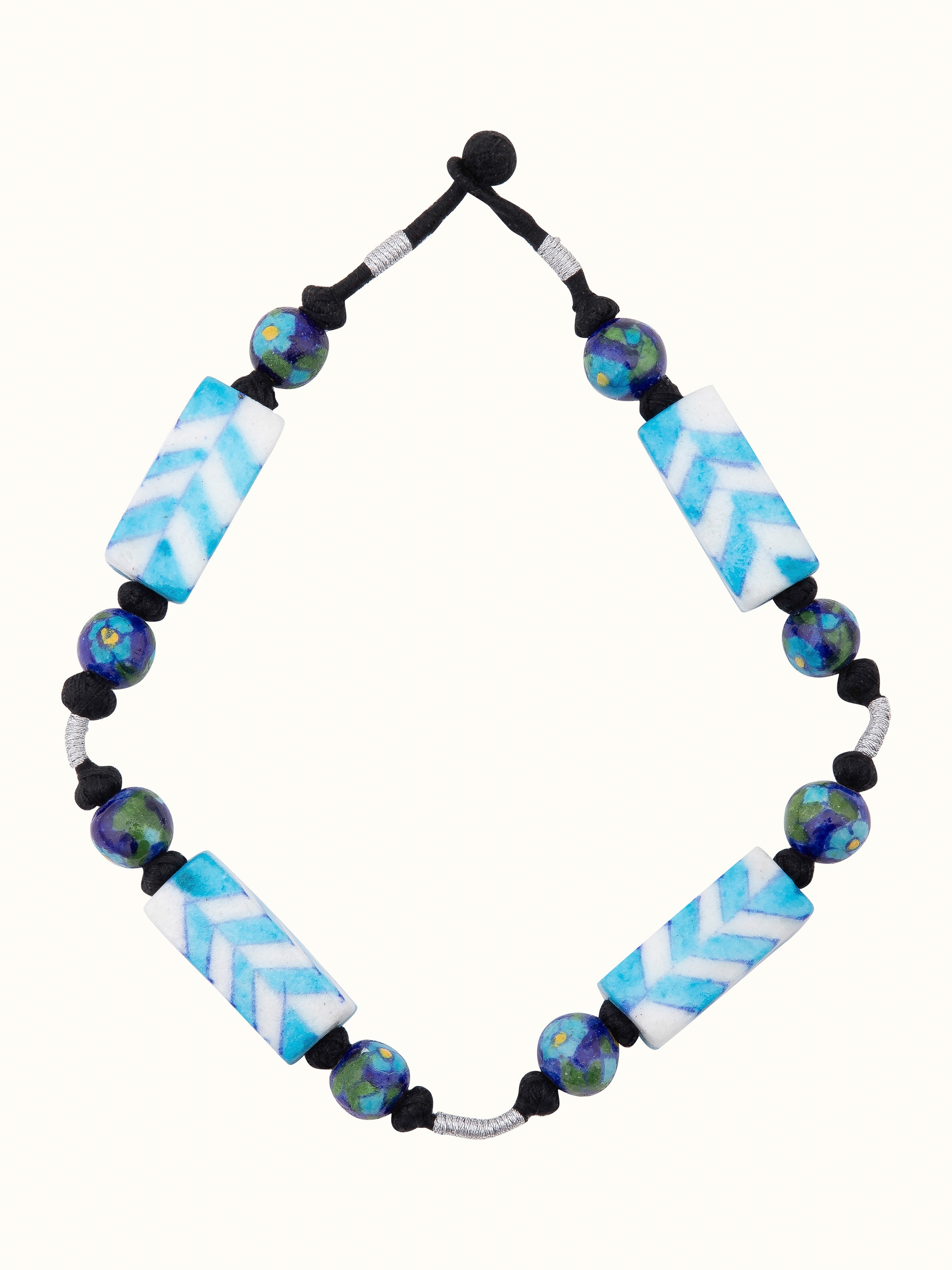 Front view of Blue Pottery Long Necklace featuring colorful blue pottery beads and a long chain design.