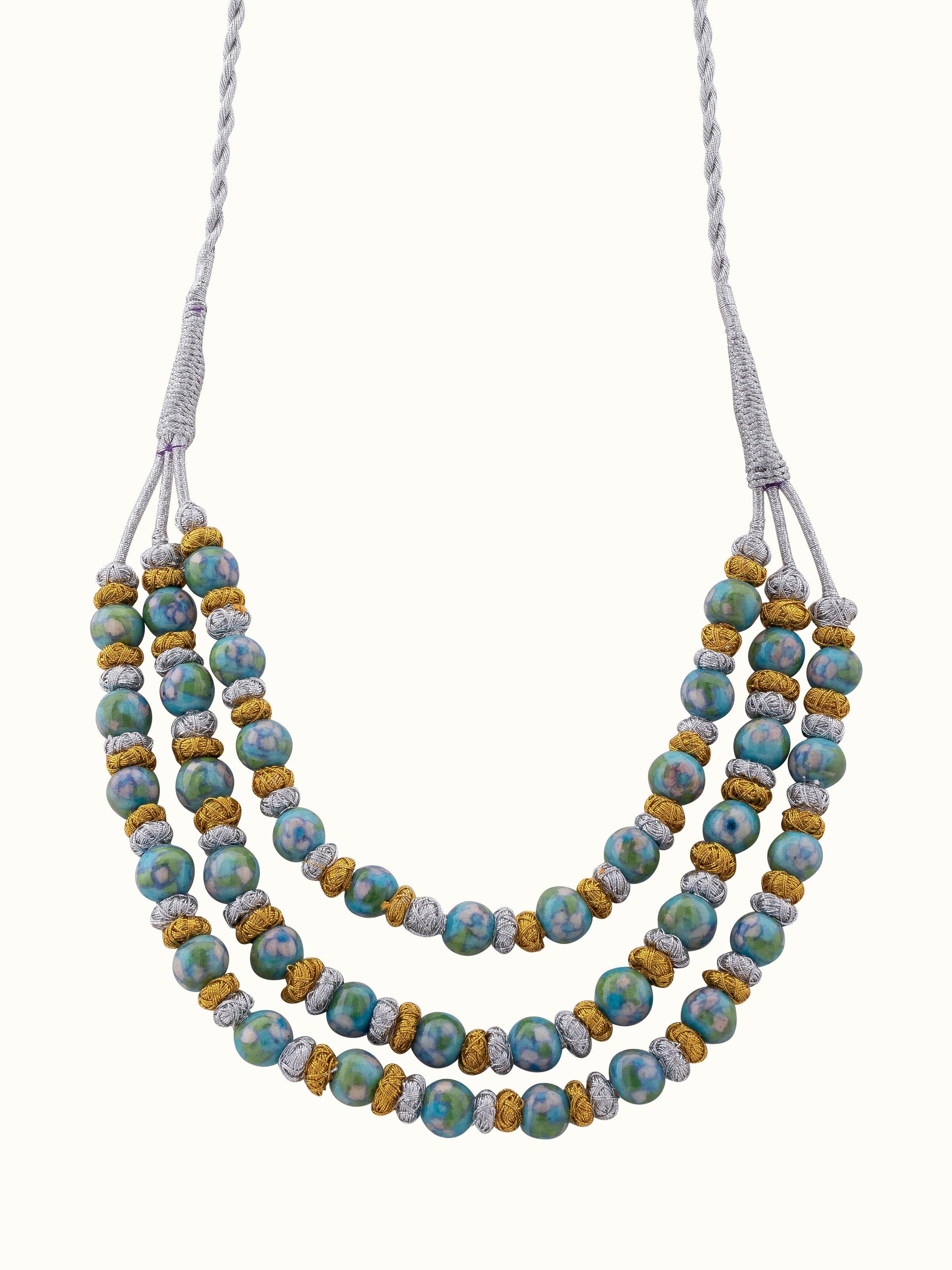 Front view of Blue Pottery Long Necklace featuring traditional blue pottery design and detailing.