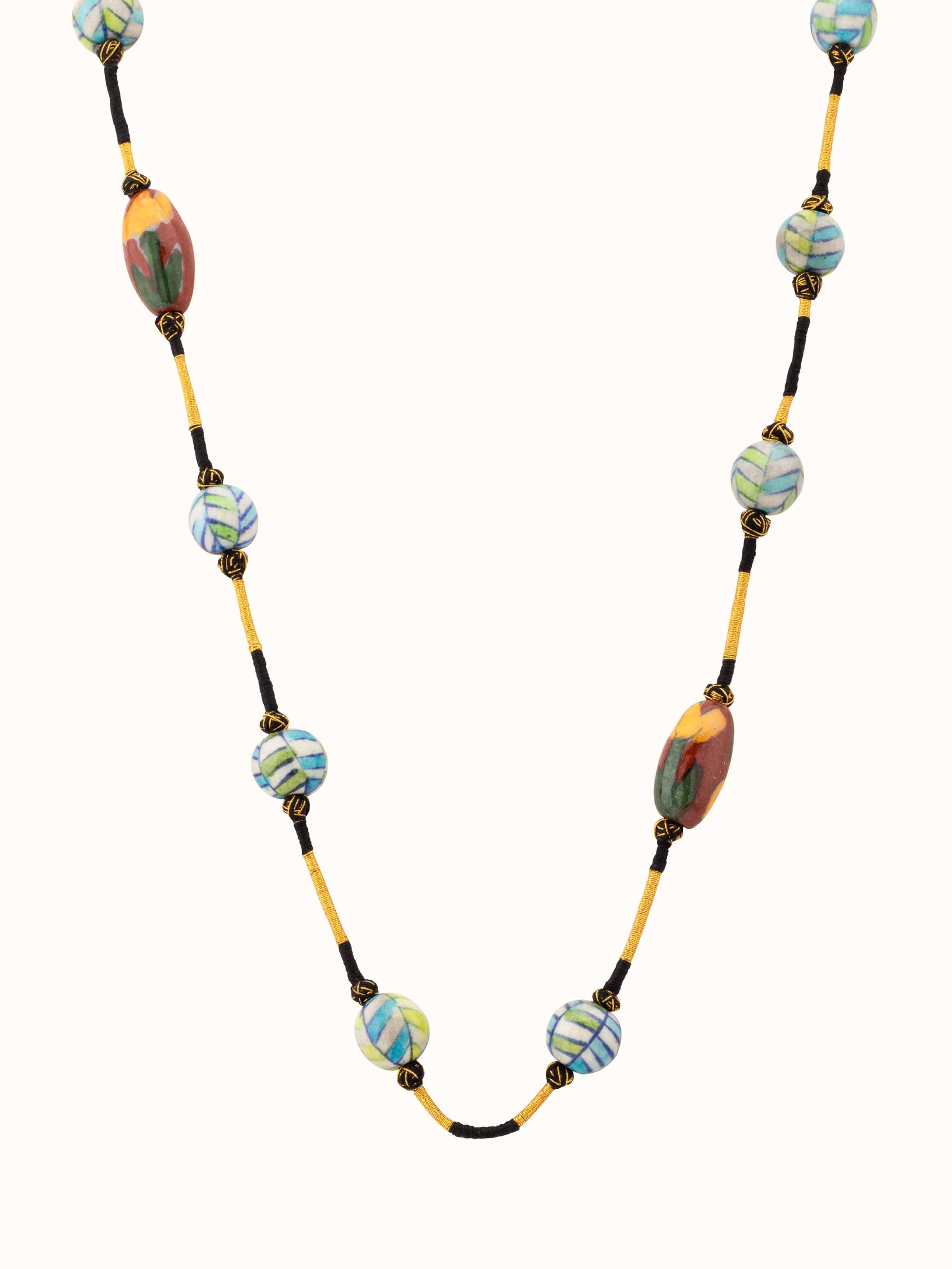 Front view of Blue Pottery Long Necklace showcasing vibrant blue pottery and detailed design.