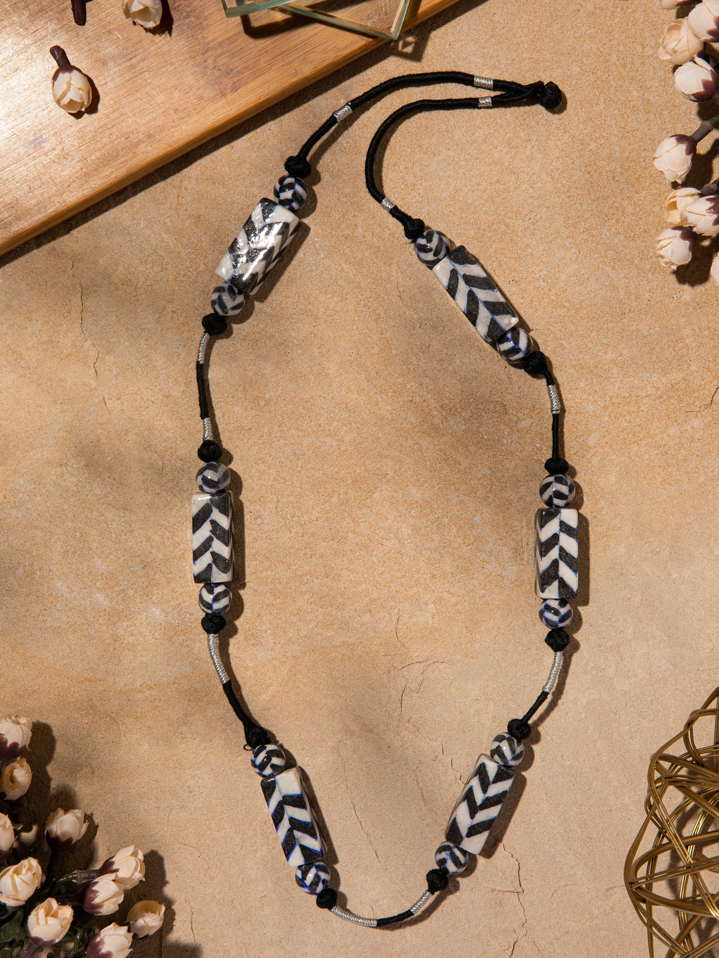 Close-up of Blue Pottery Long Necklace highlighting the detailed blue pottery craftsmanship and intricate beadwork.