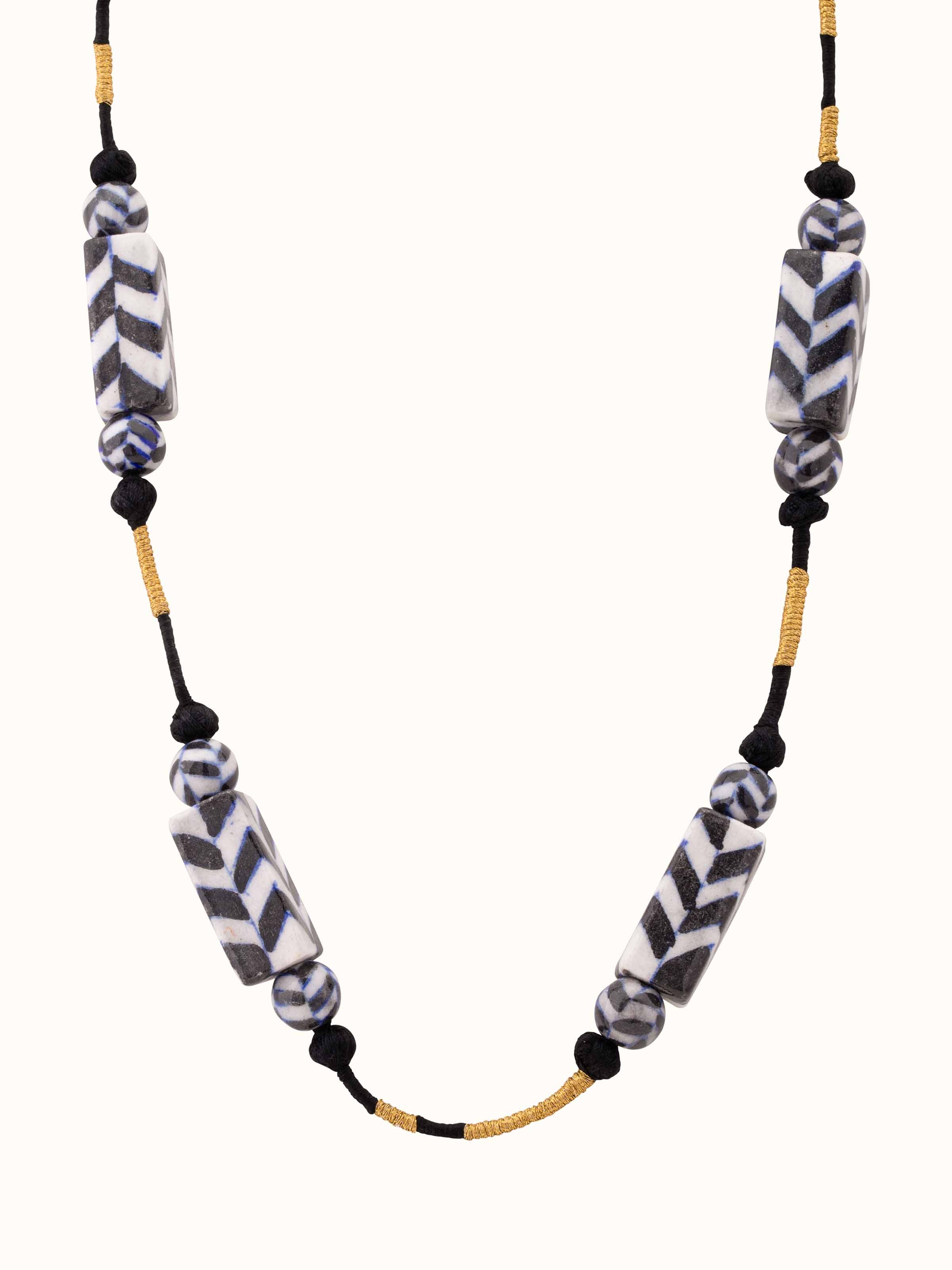 Front view of Blue pottery long necklace showcasing its unique ceramic design and vibrant colors