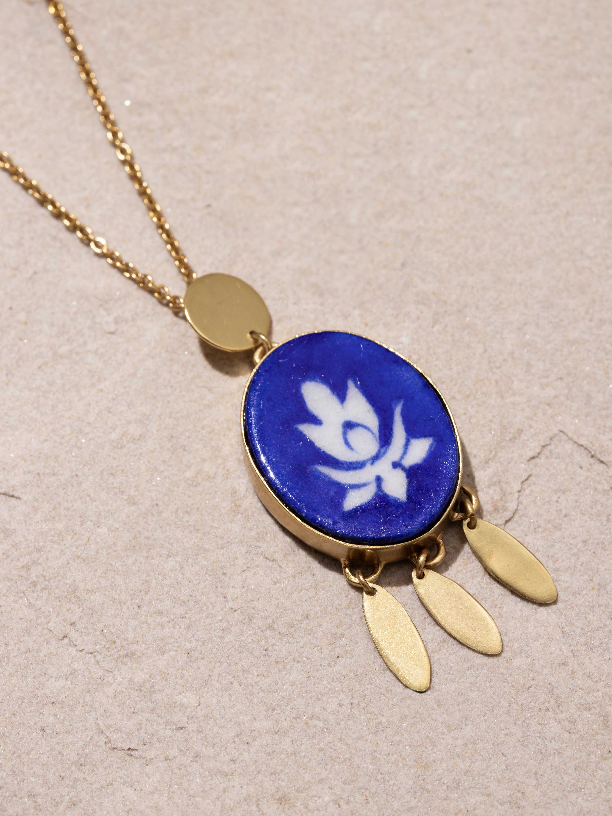 Back view of Blue Pottery Pendant and Chain featuring the smooth finish and secure clasp of the chain.