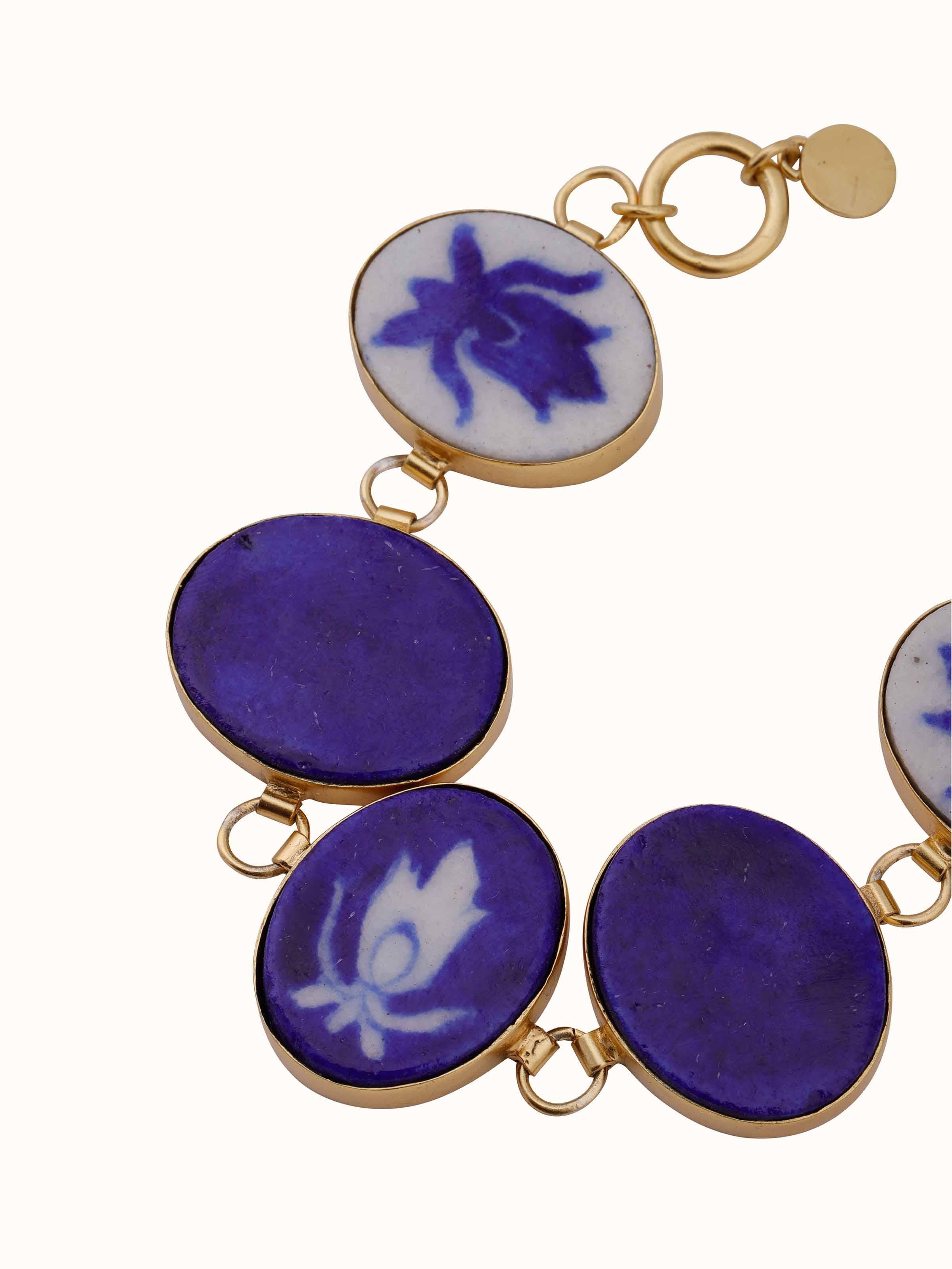Overhead view of Blue Pottery Flexible Bracelet displaying its full design and detailed pottery work