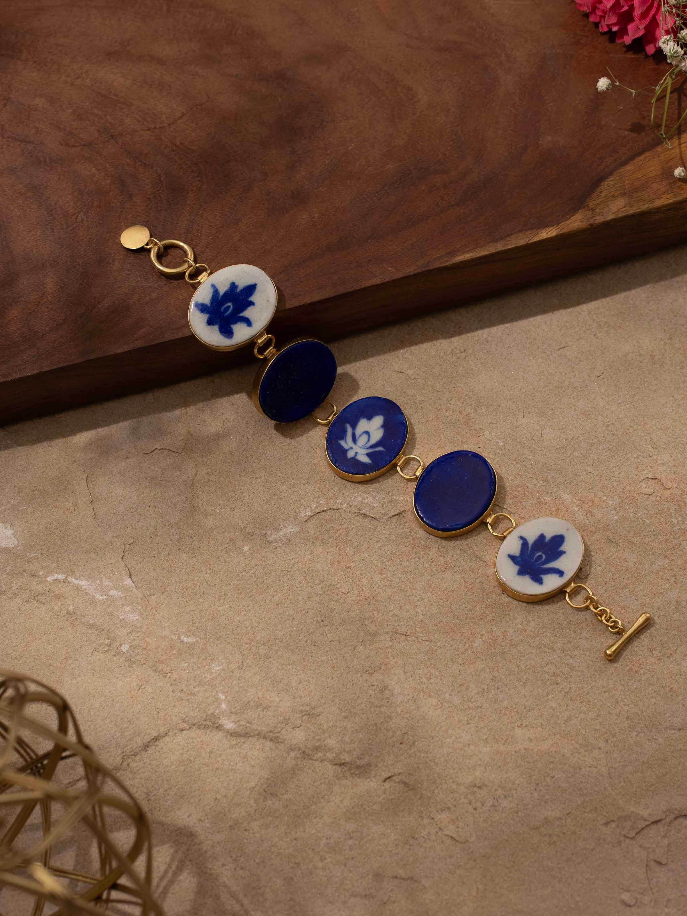 Detailed view of Blue Pottery Flexible Bracelet emphasizing the unique pottery patterns and colors