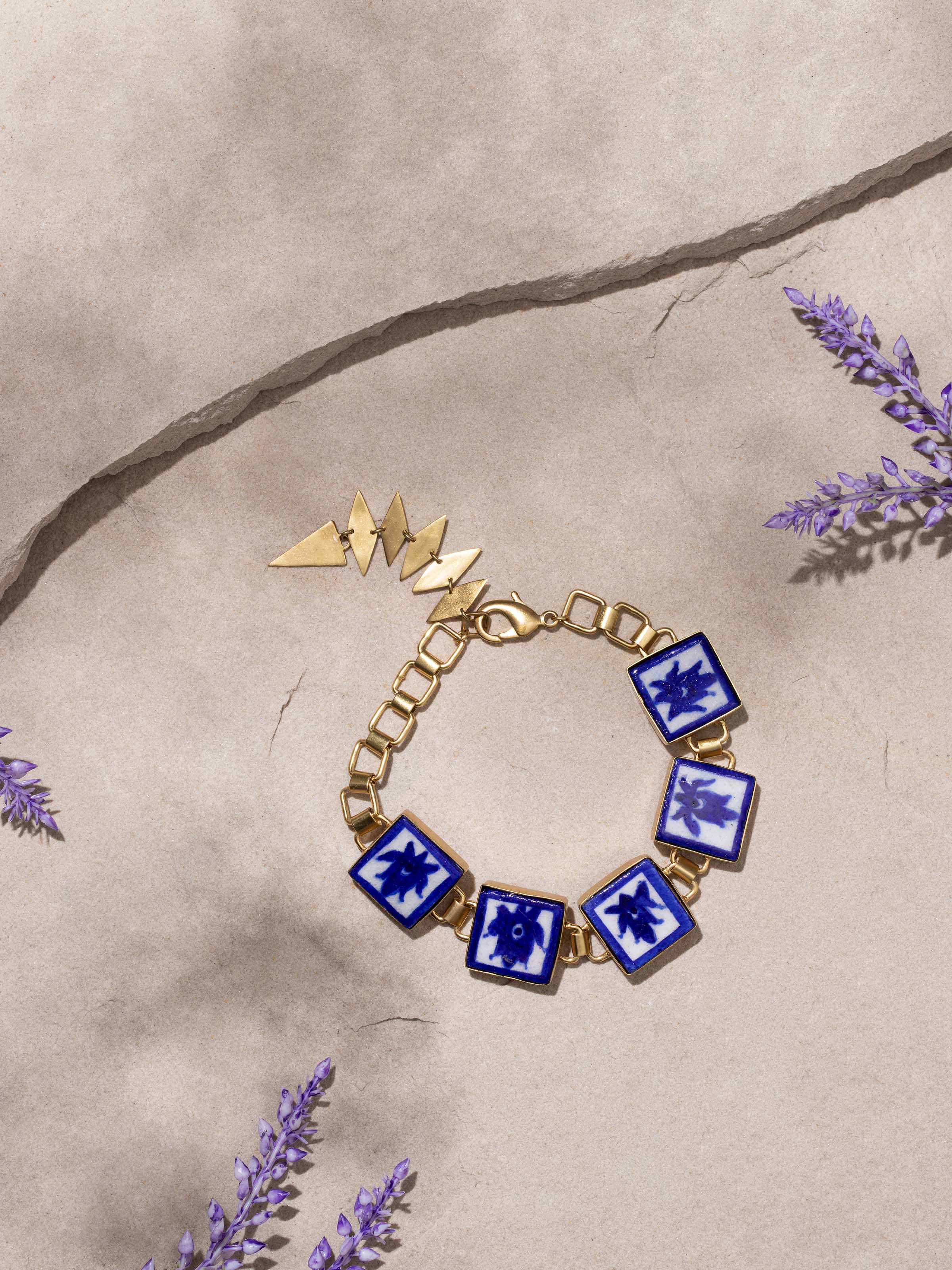 Side view of Blue Pottery Flexible Bracelet showcasing flexible design and ceramic details.