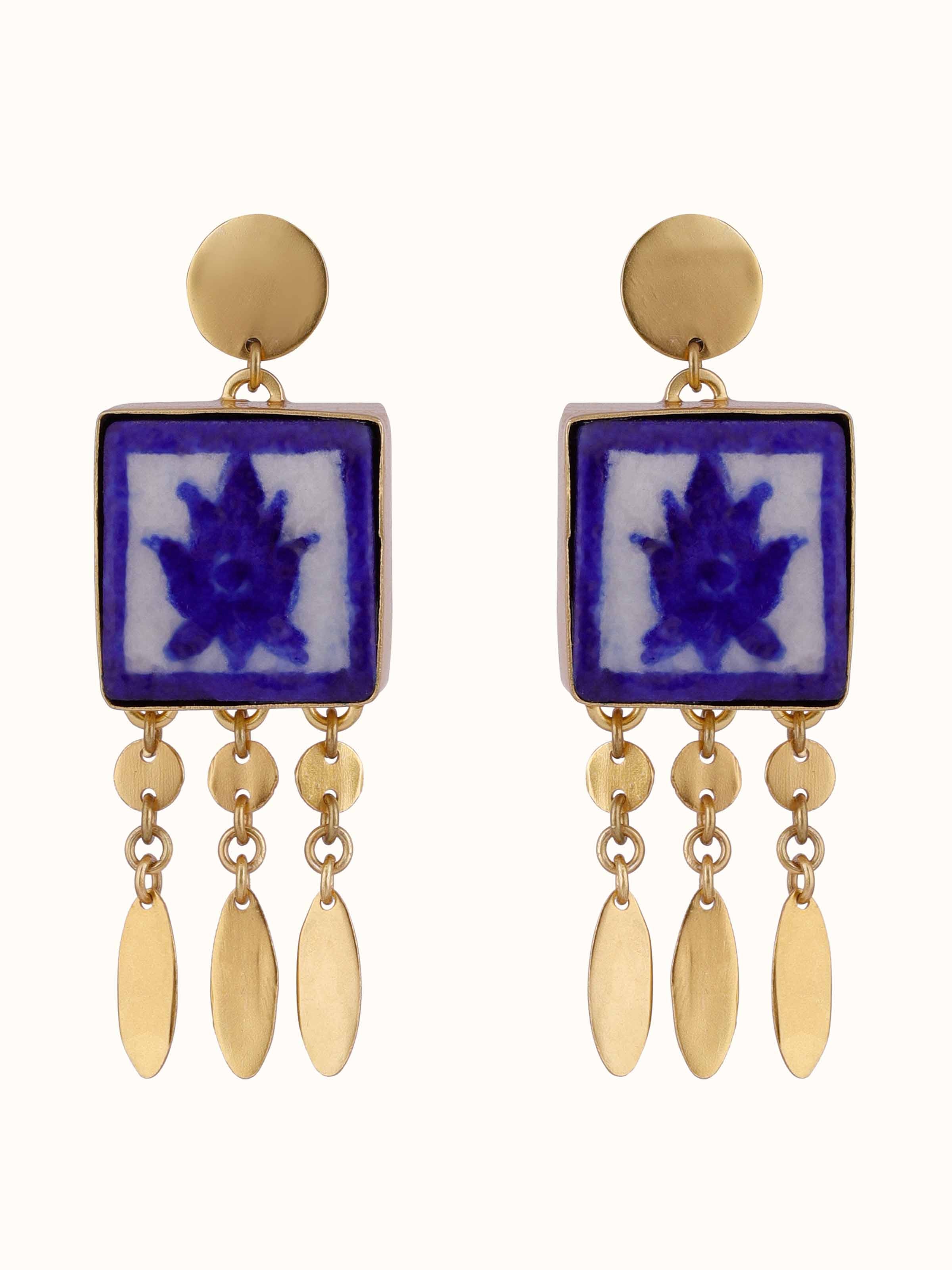 Front view of blue pottery drop earrings featuring traditional design and vibrant blue color.