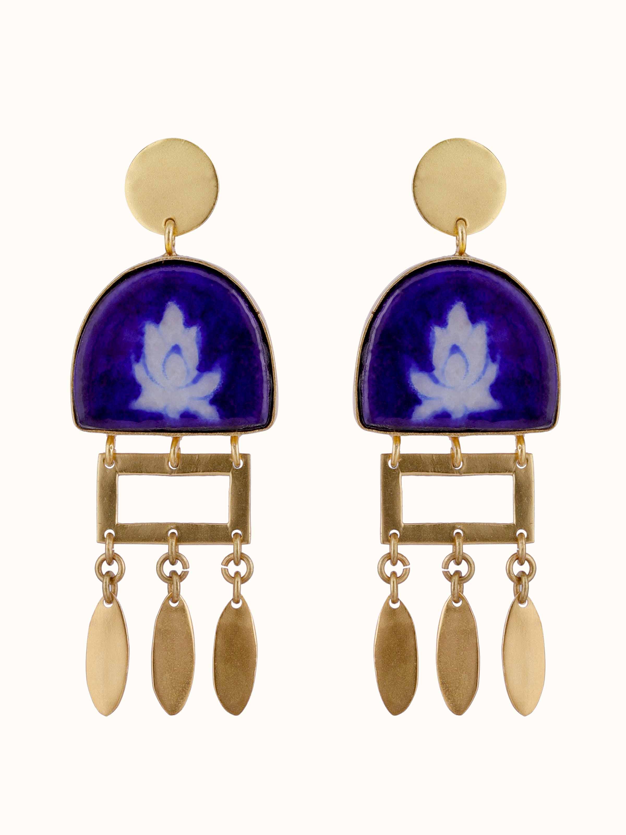 Overhead view of Blue Pottery Drop Earrings showcasing intricate blue and white ceramic design.