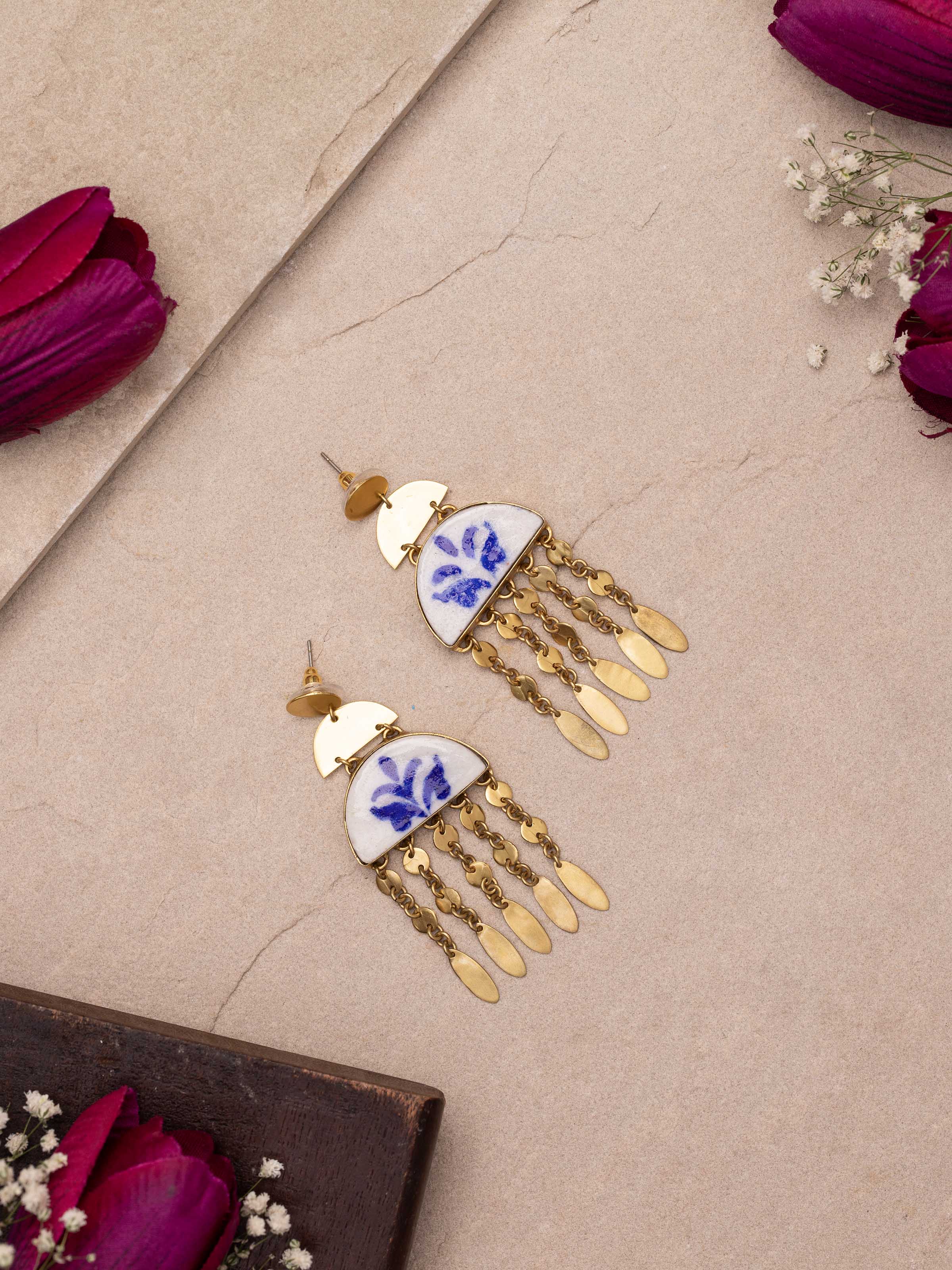 Close-up view of Blue Pottery drop earrings emphasizing intricate pottery details and vibrant colors